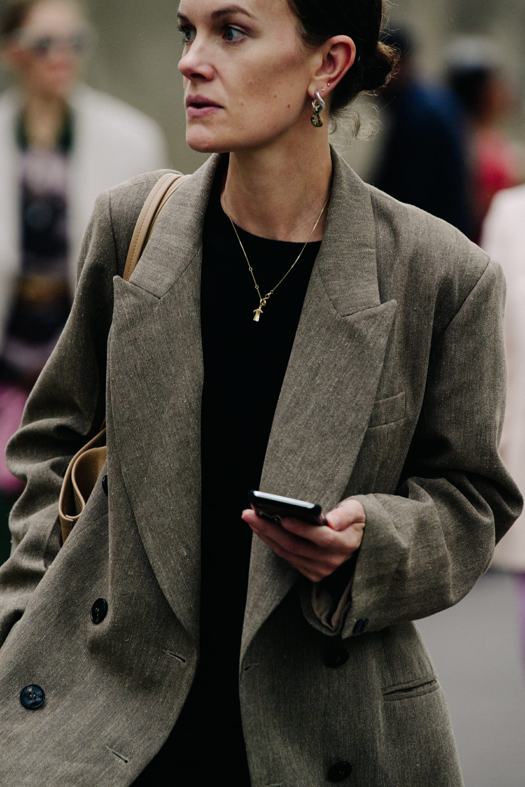 Woman wearing grey coat