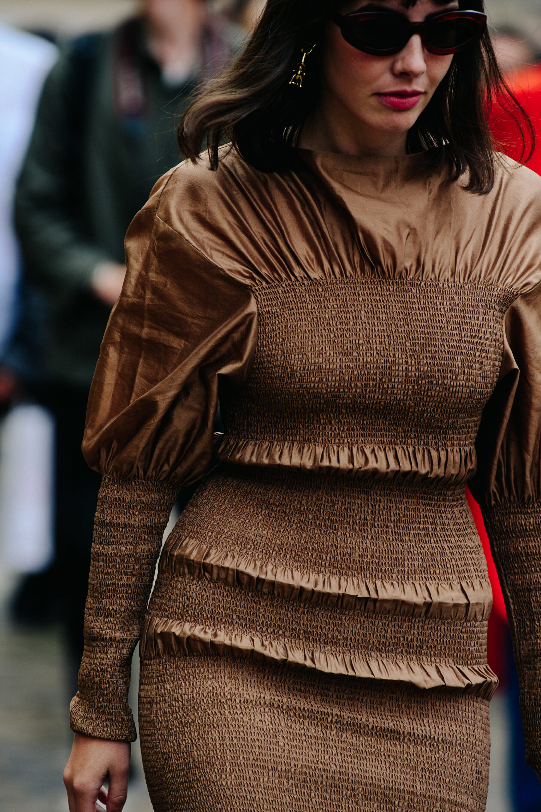 Woman wearing brown dress