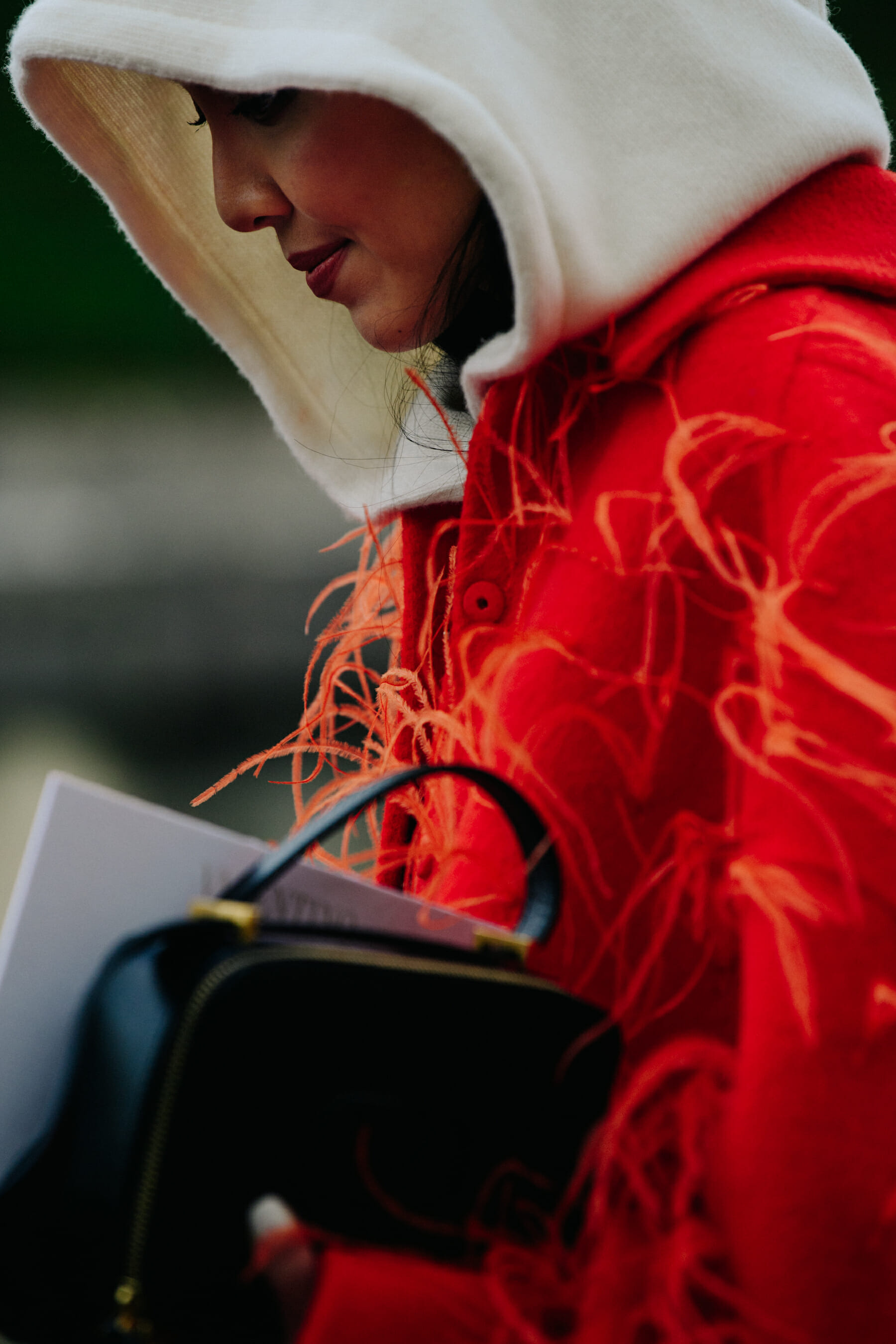 Woman wearing red jacket