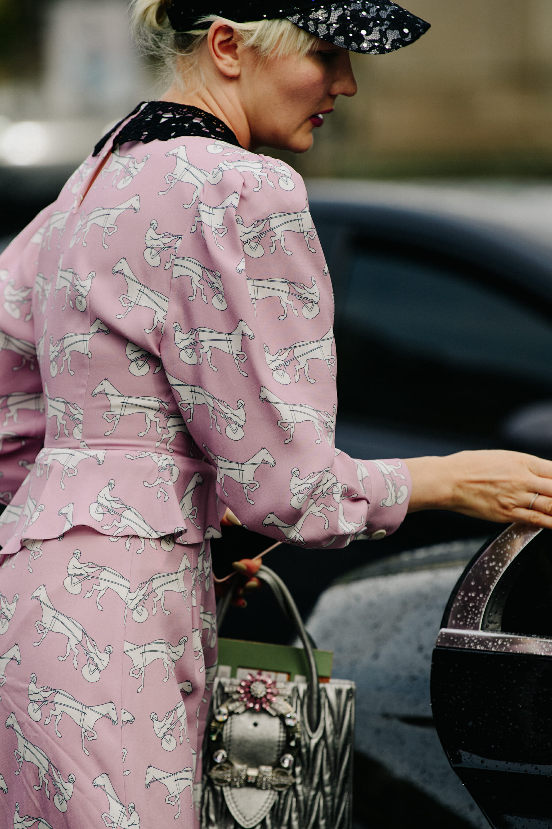 Woman wearing Coach dress
