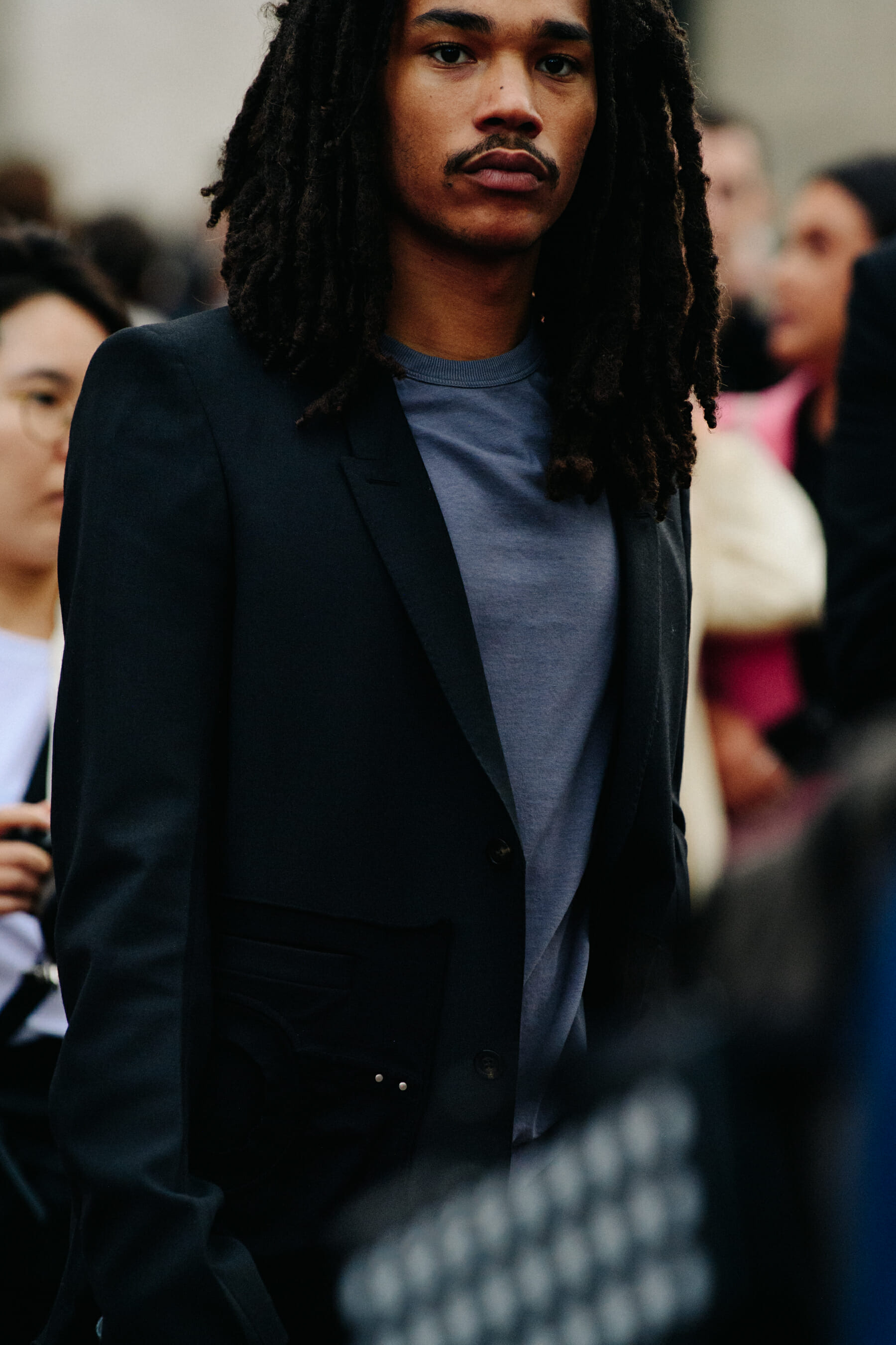 Man wearing grey tee shirt