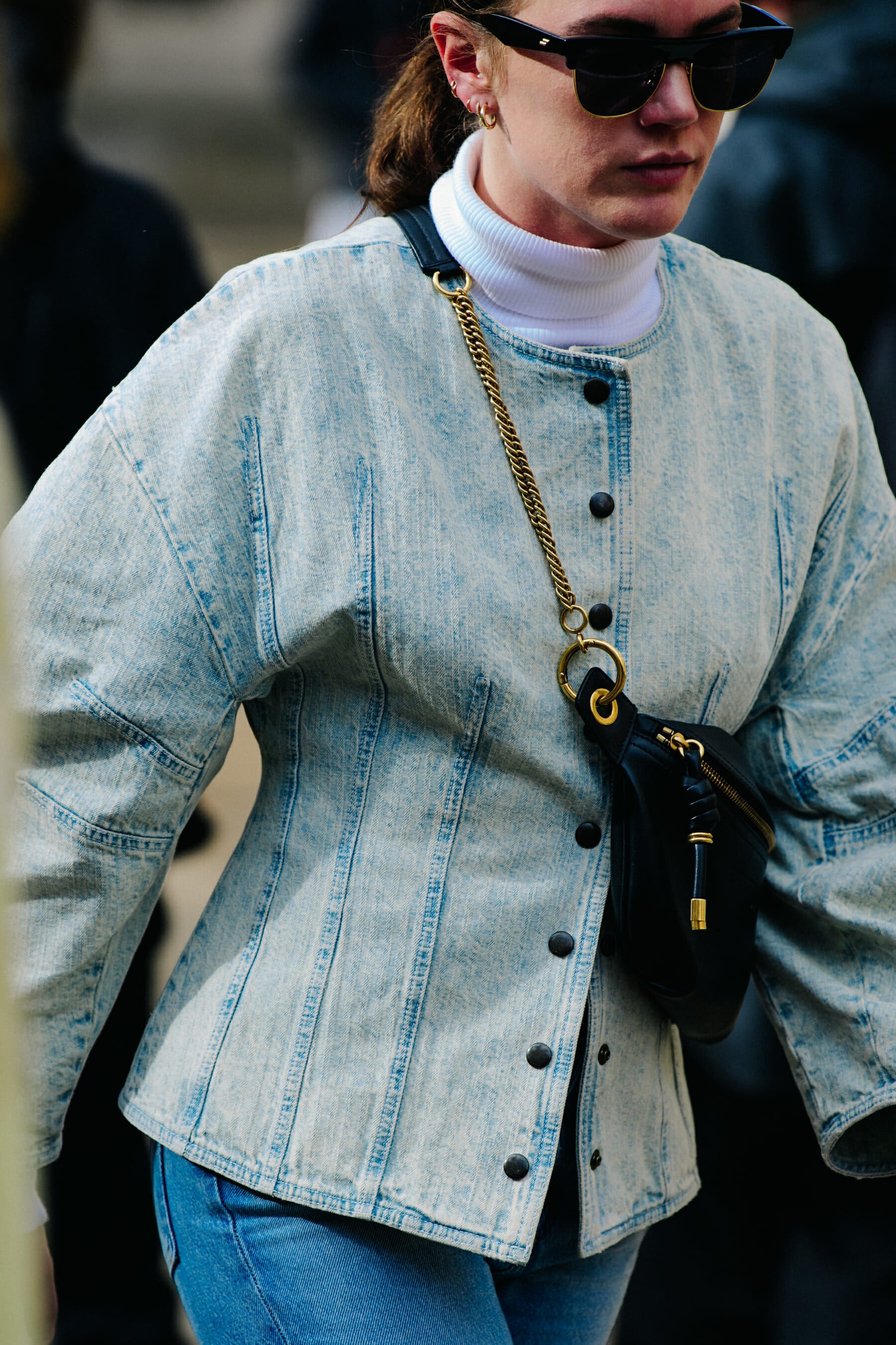 Woman wearing denim jacket