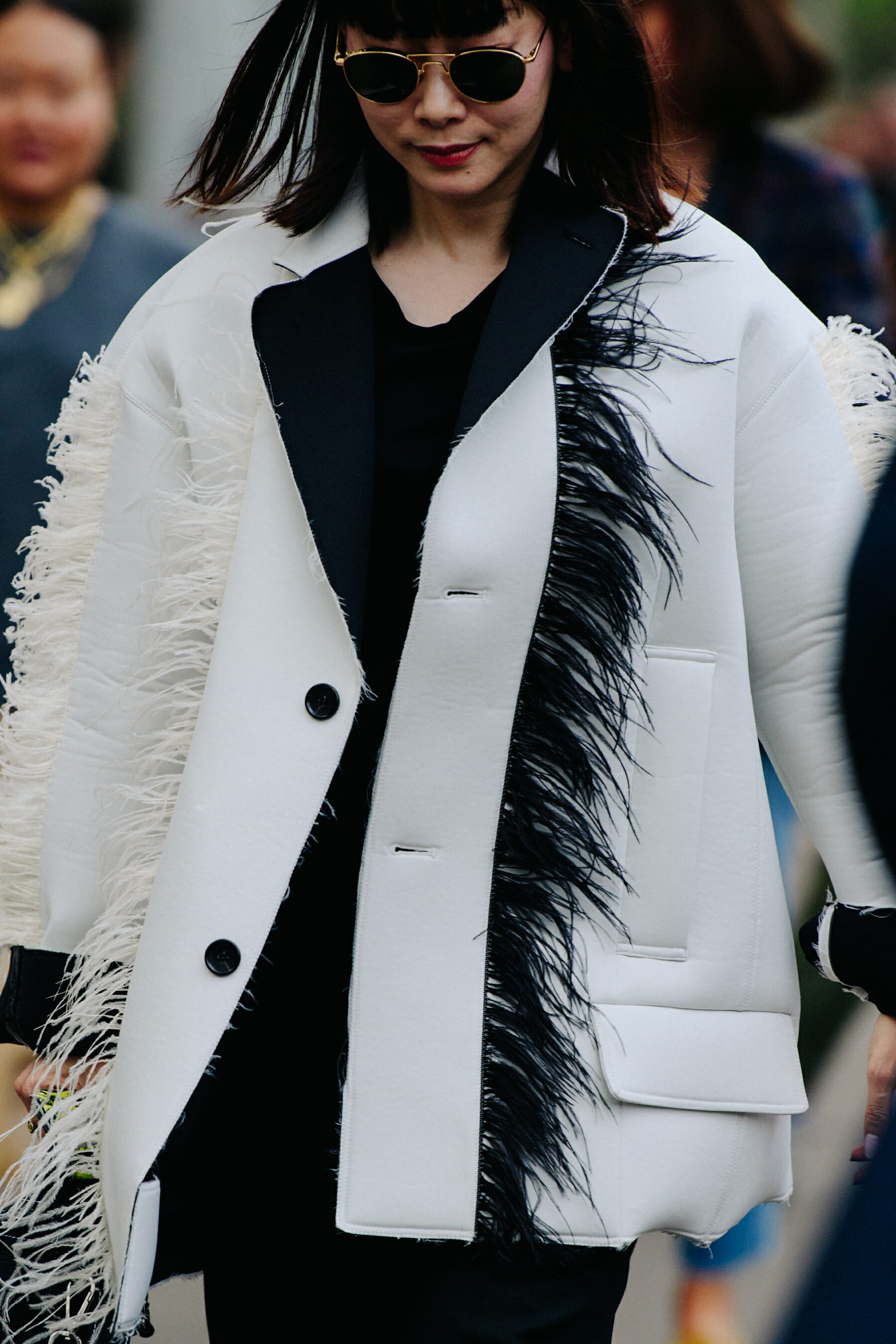 Woman wearing white jacket