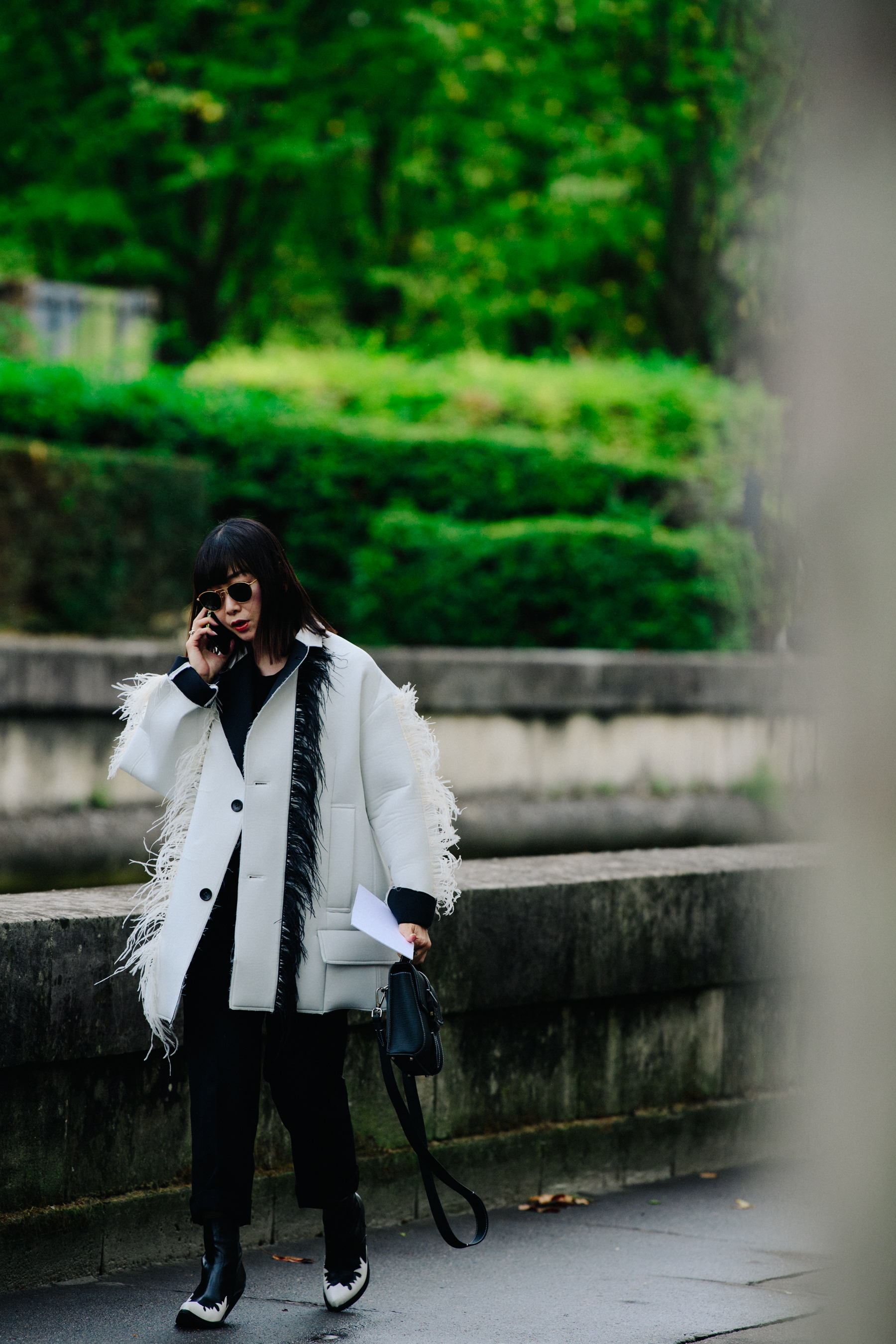 Woman wearing white jacket