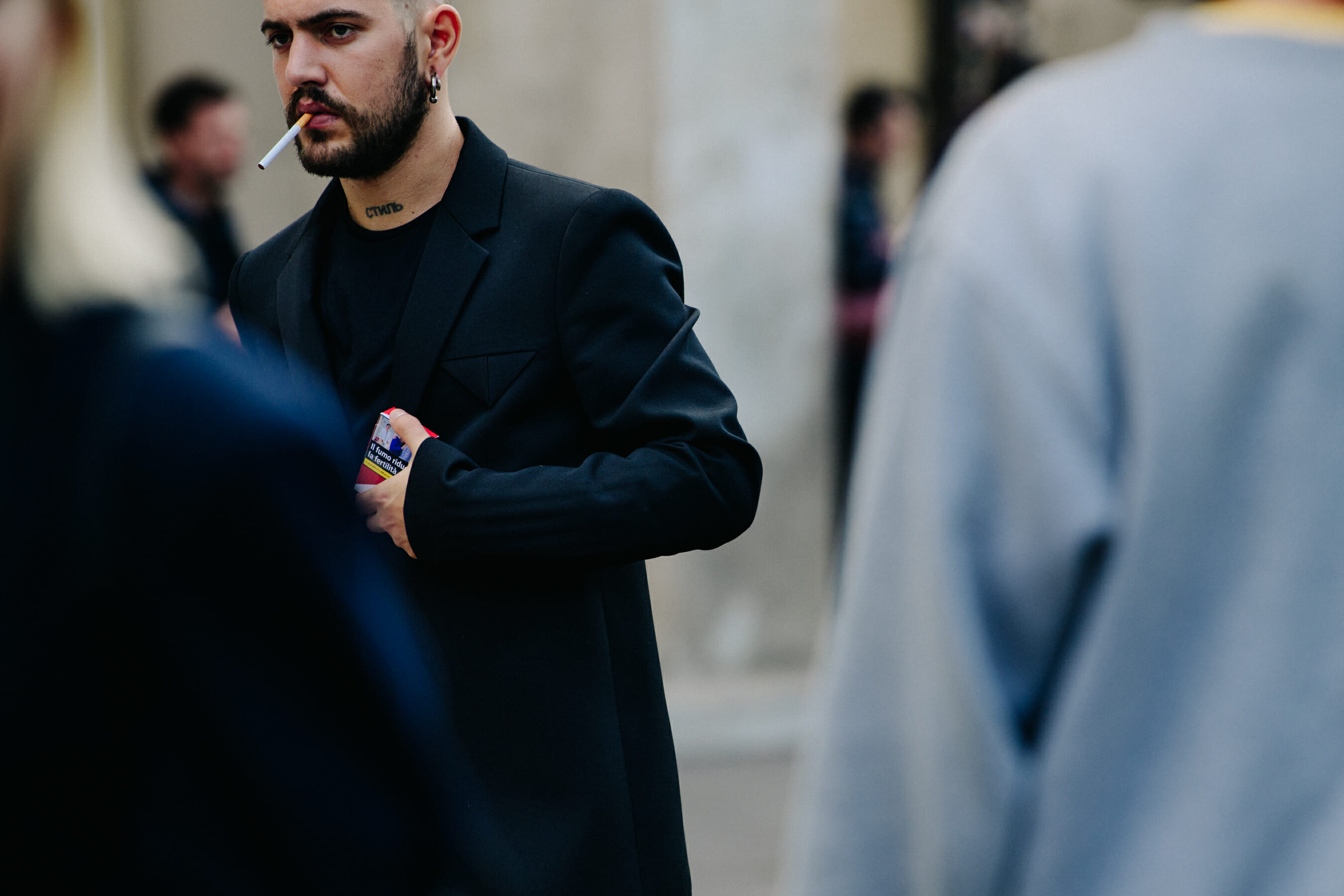 Man wearing black suit