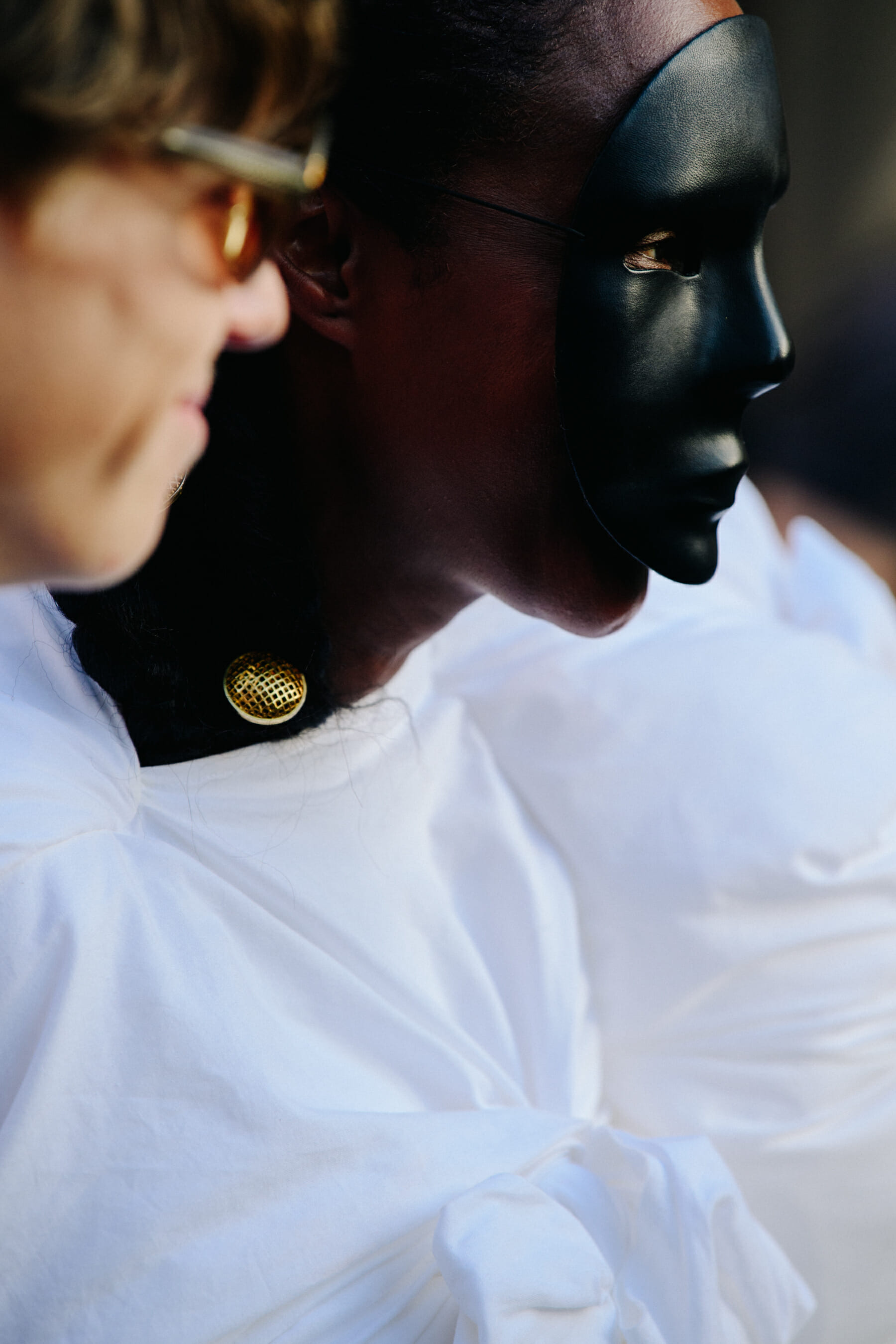 Woman wearing black face mask