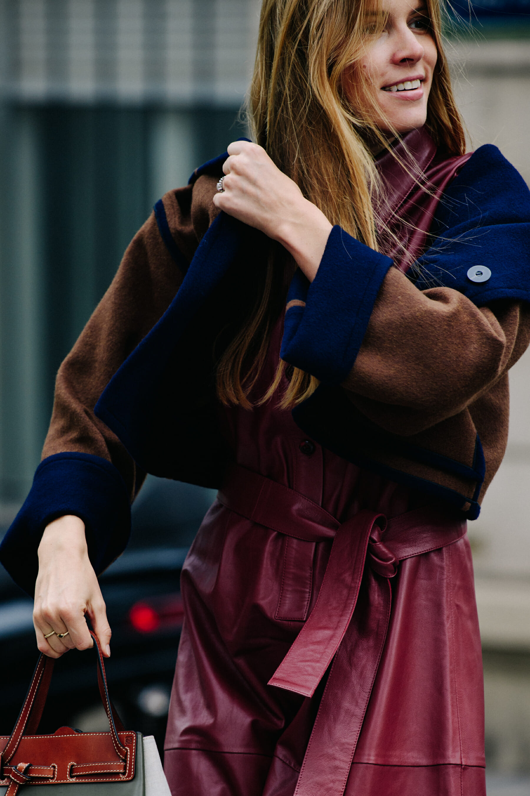 Model wearing brown jacket