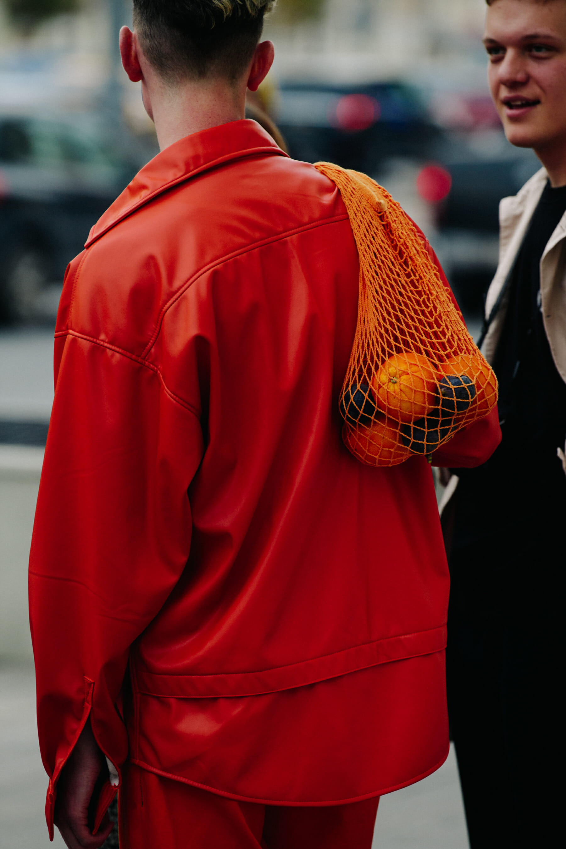 Man carrying Oranges