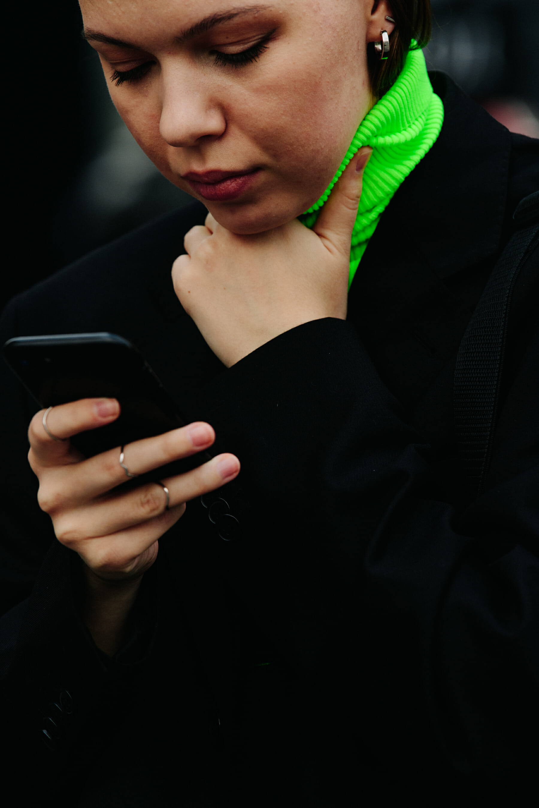 Woman wearing green knit