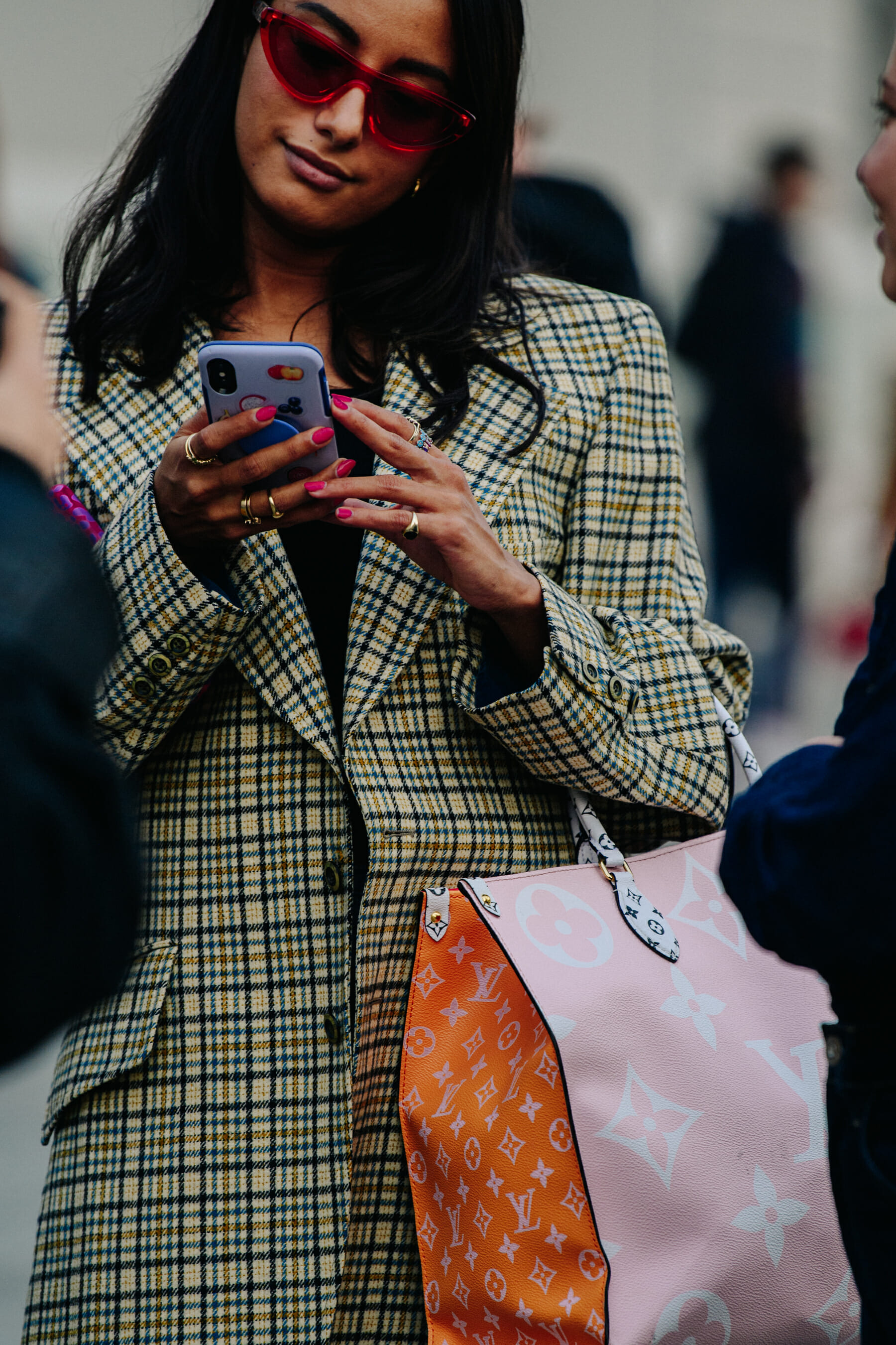 Woman wearing check coat