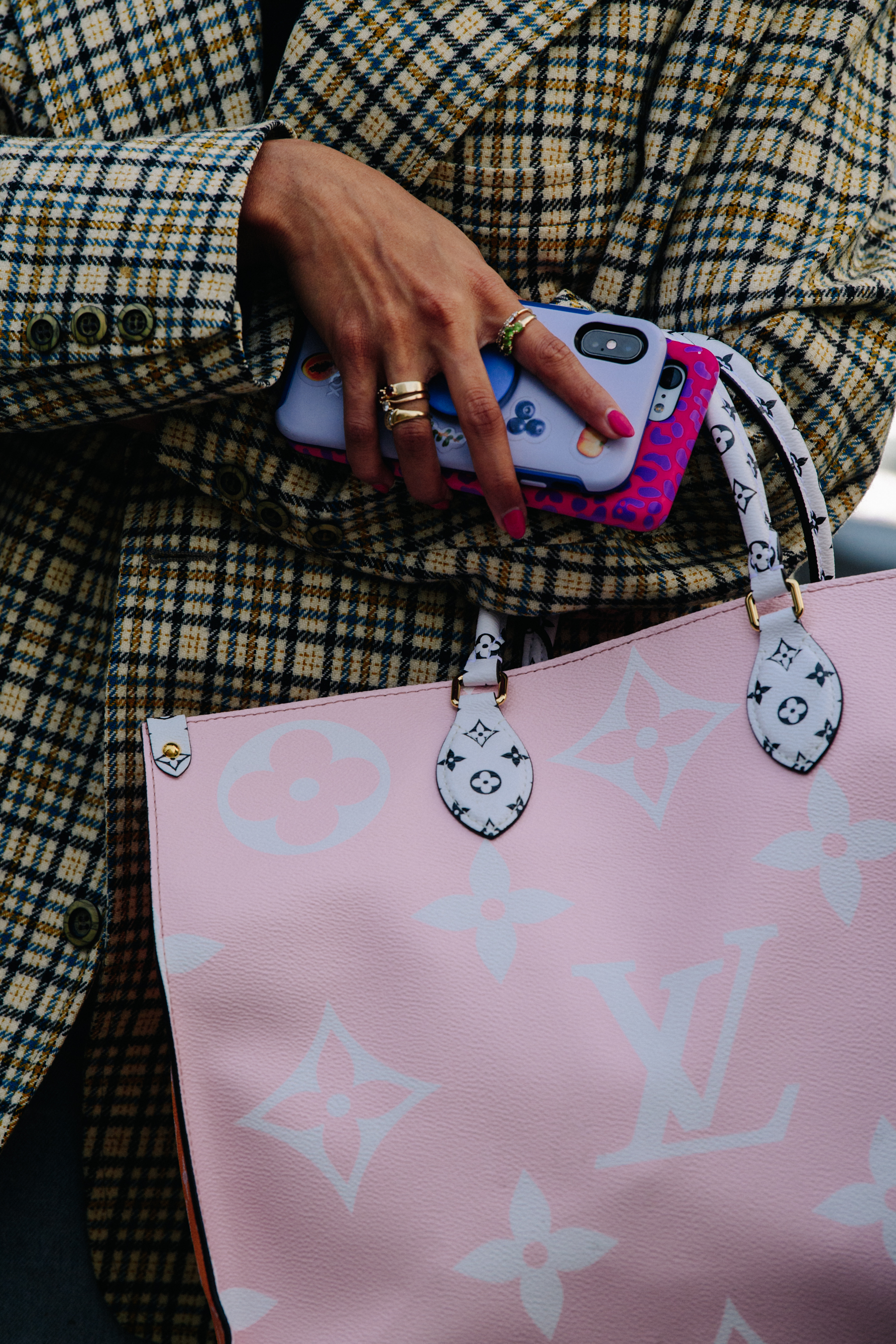 Woman carrying Louis Vuitton bag