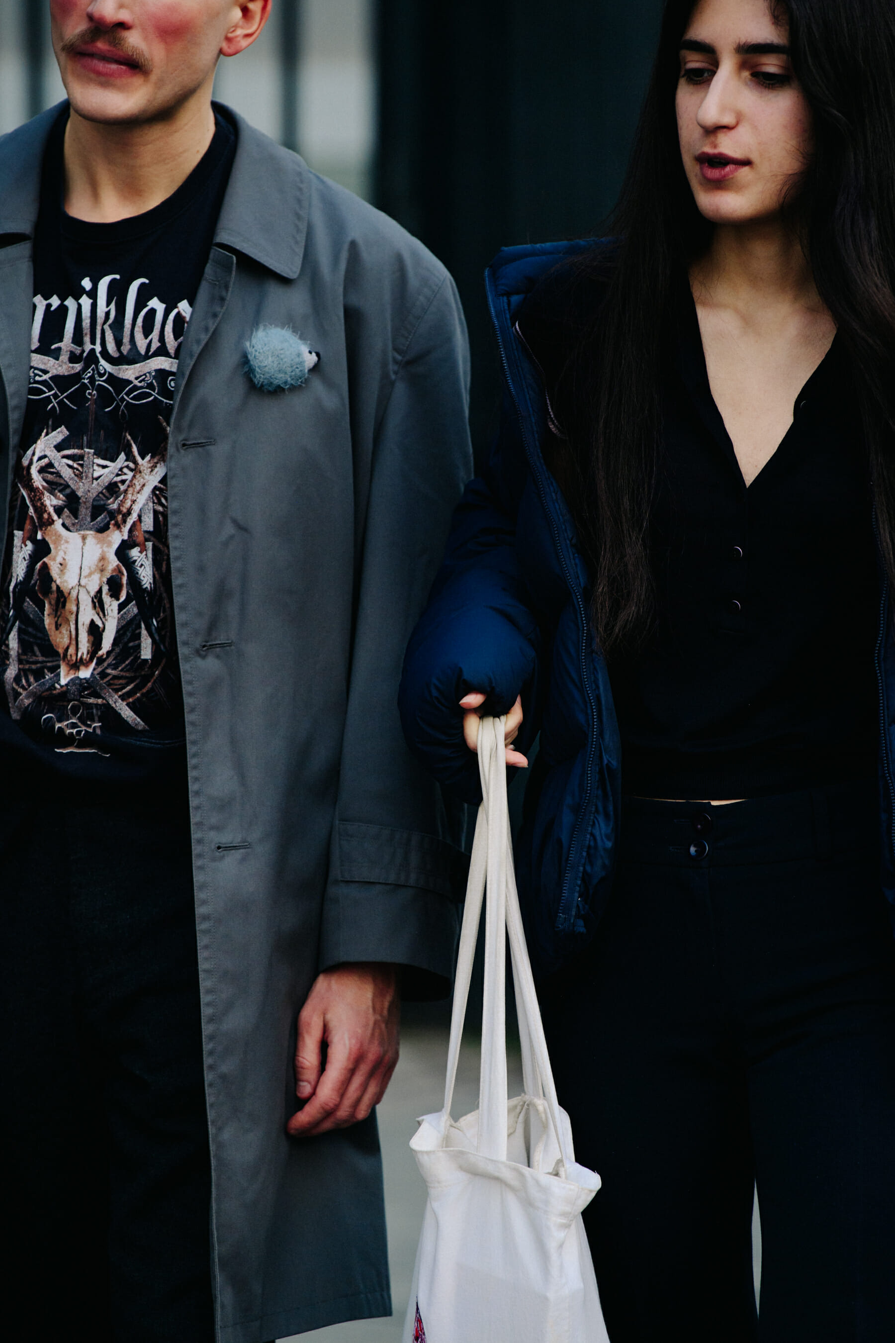 Couple wearing dark coats