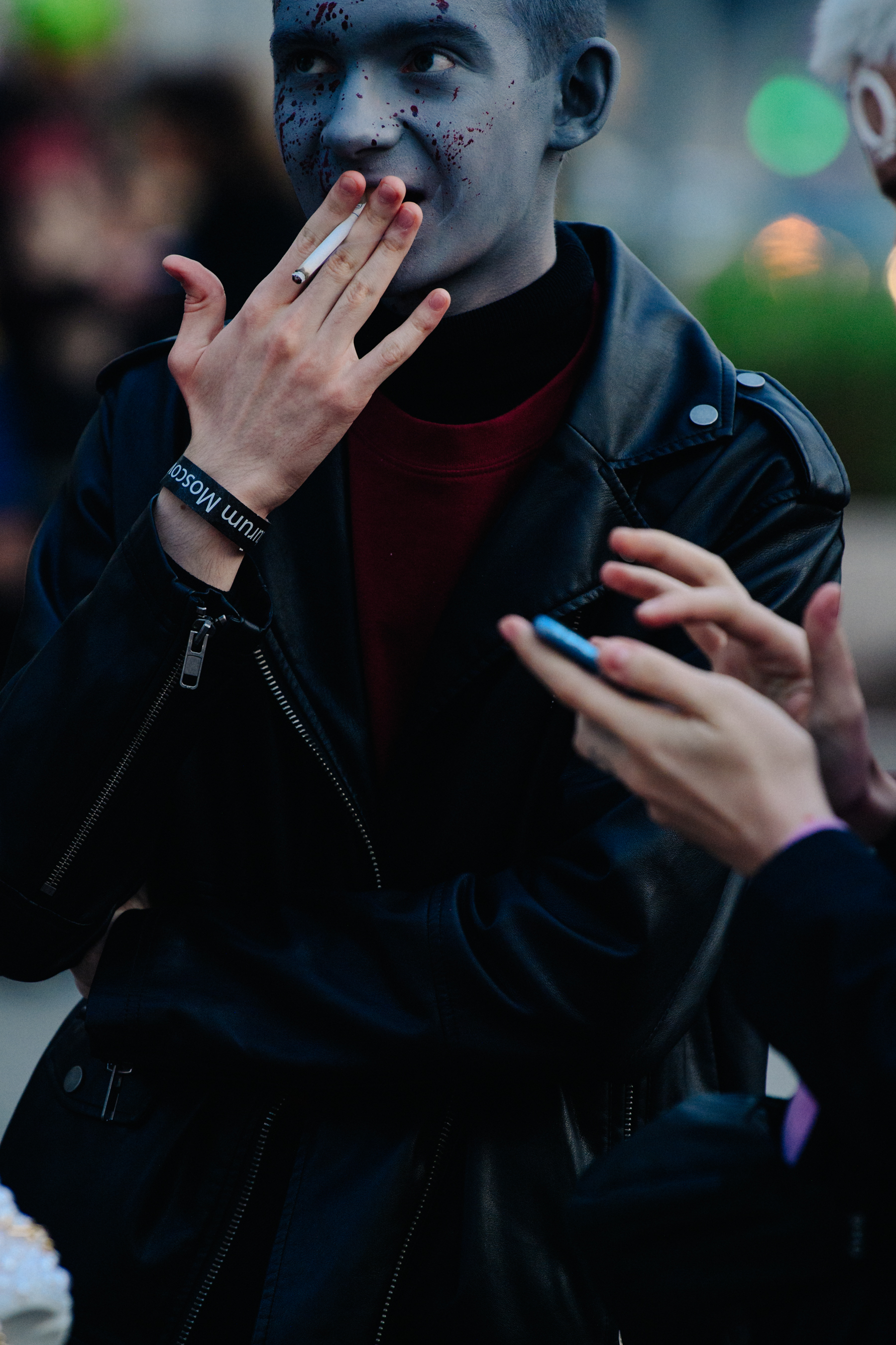 Man wearing grey facepaint