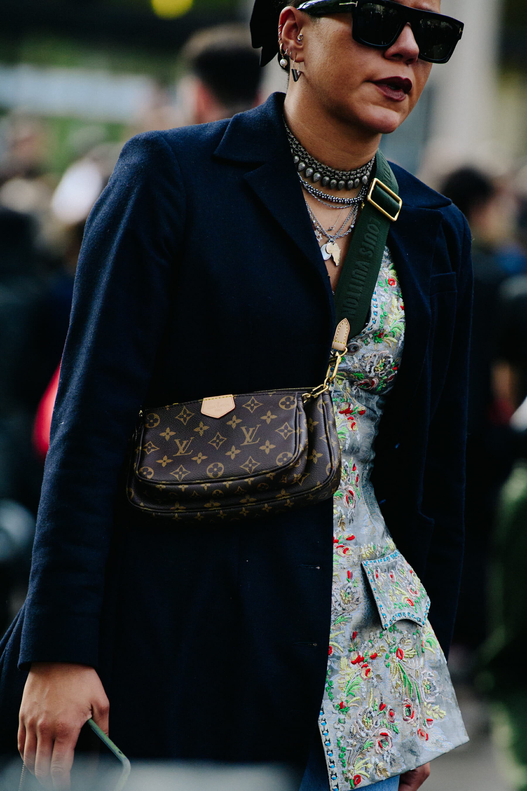 Woman wearing Louis Vuitton bag