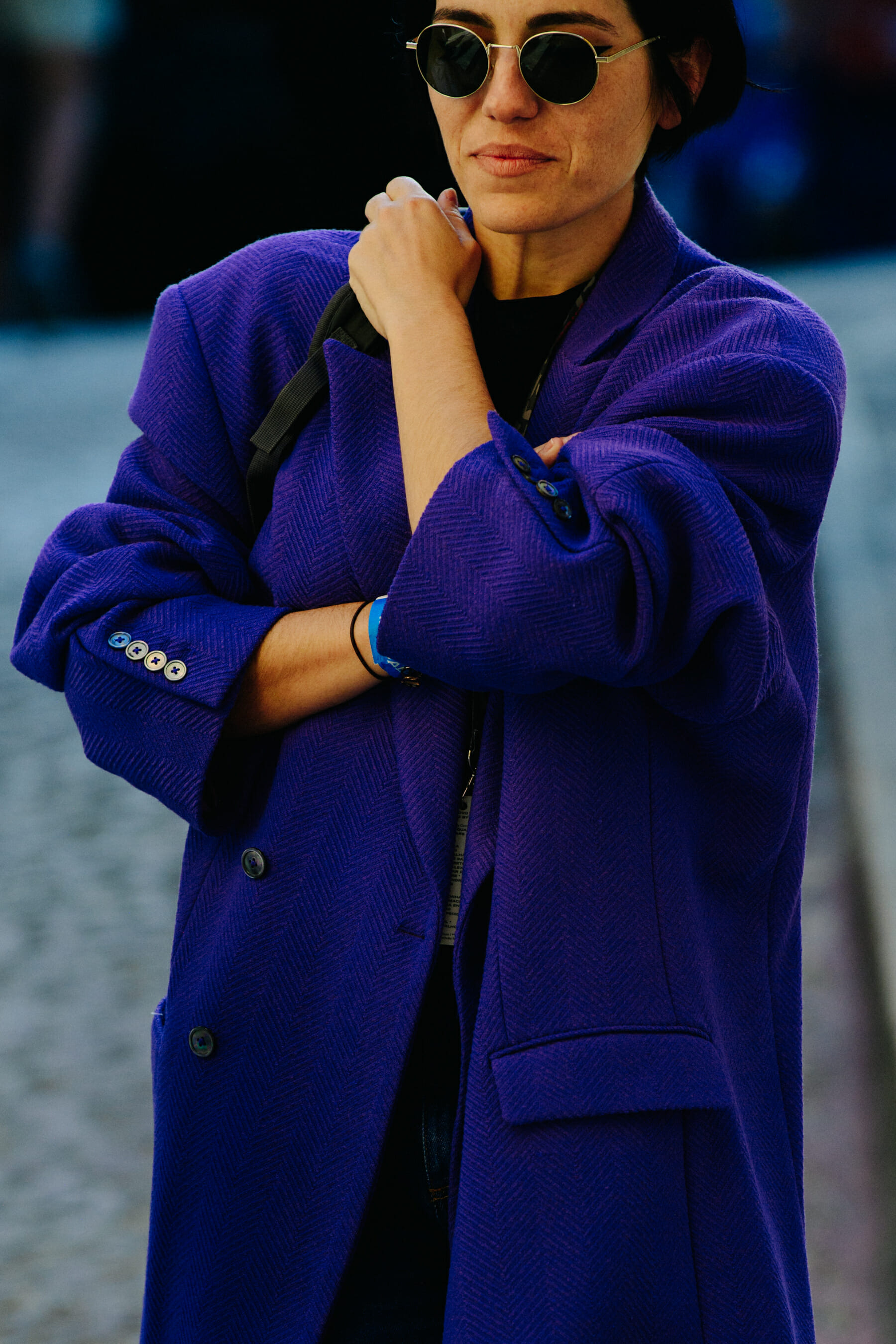 Woman wearing purple coat
