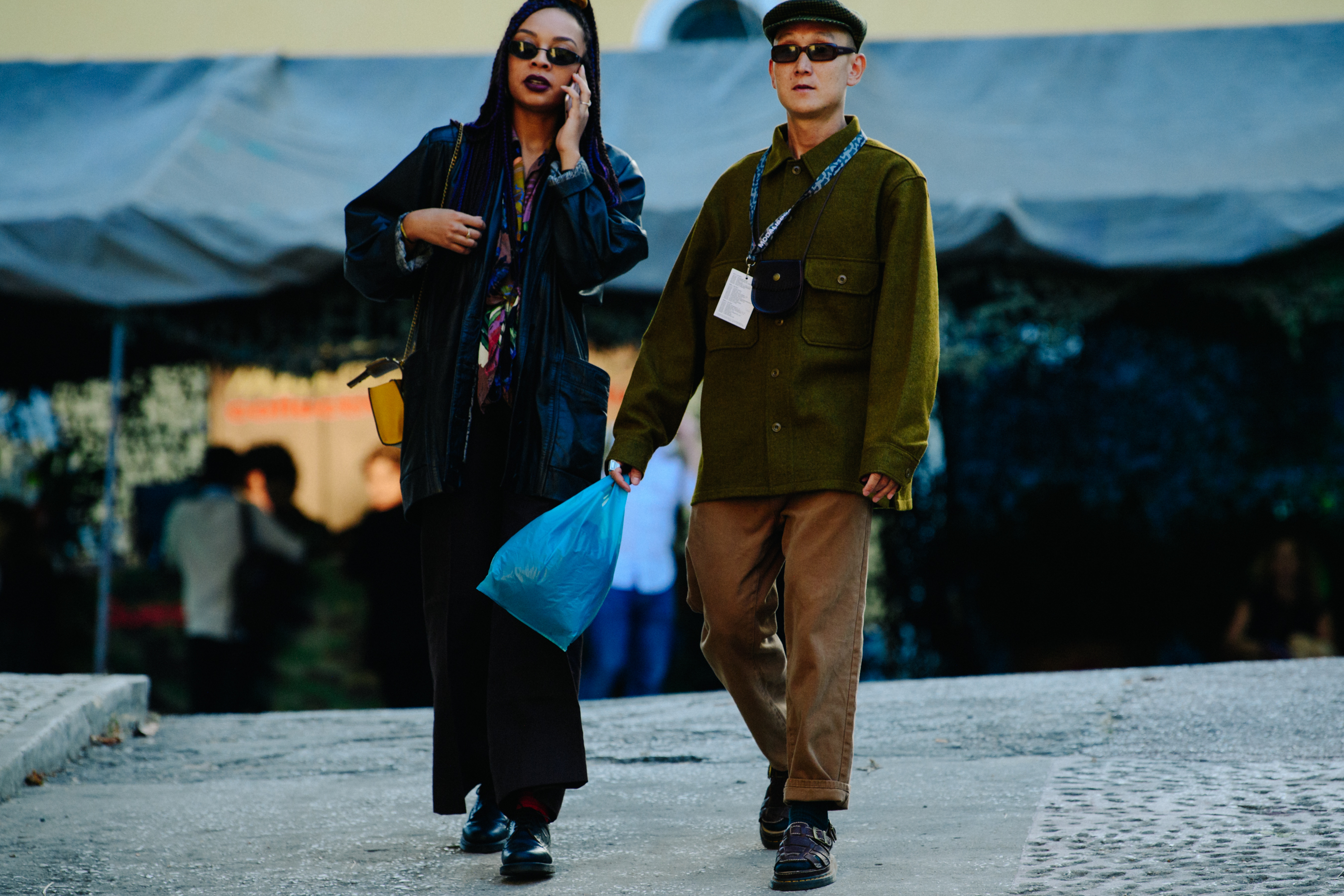 Couple wearing dark outfits