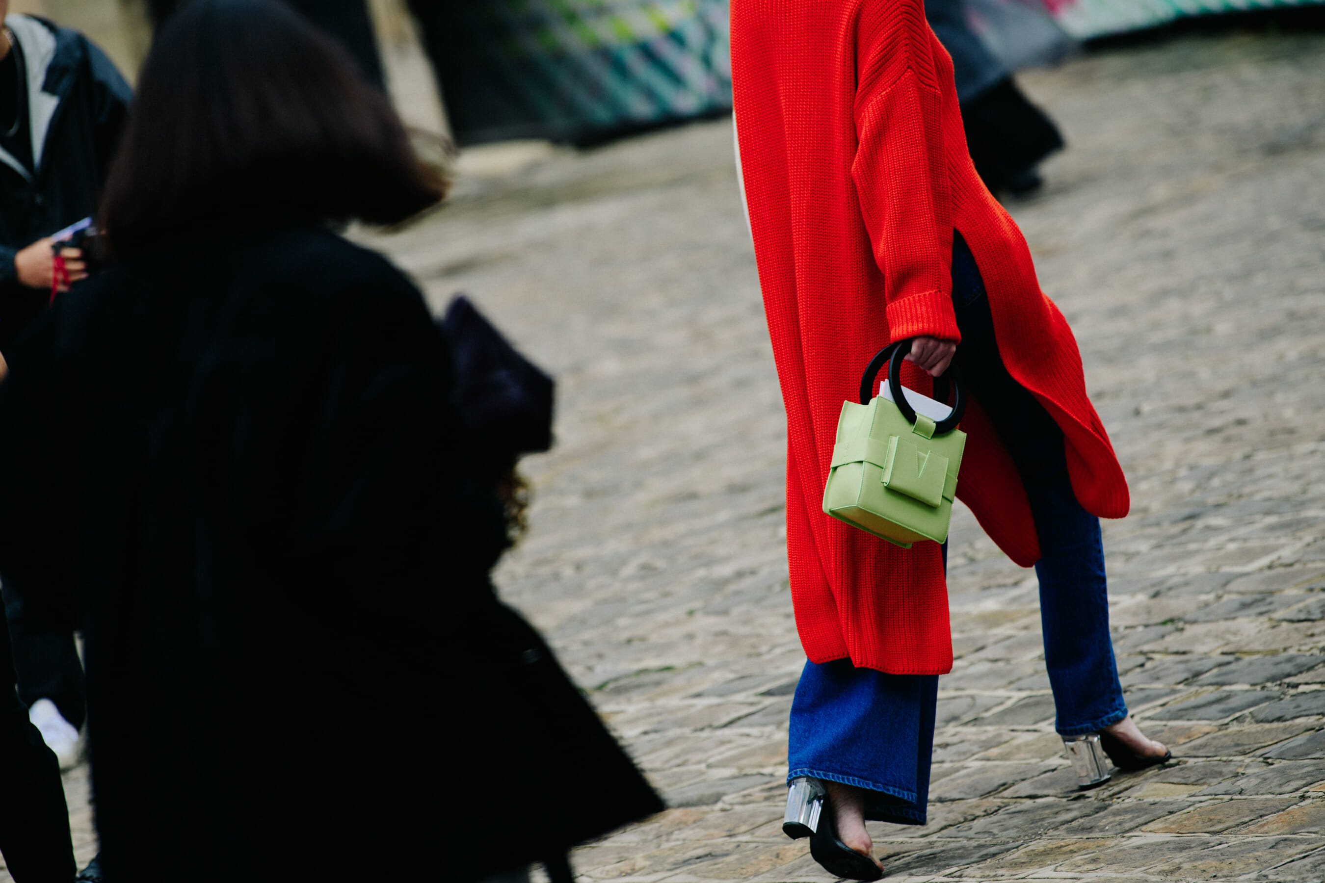 Woman wearing red jumper