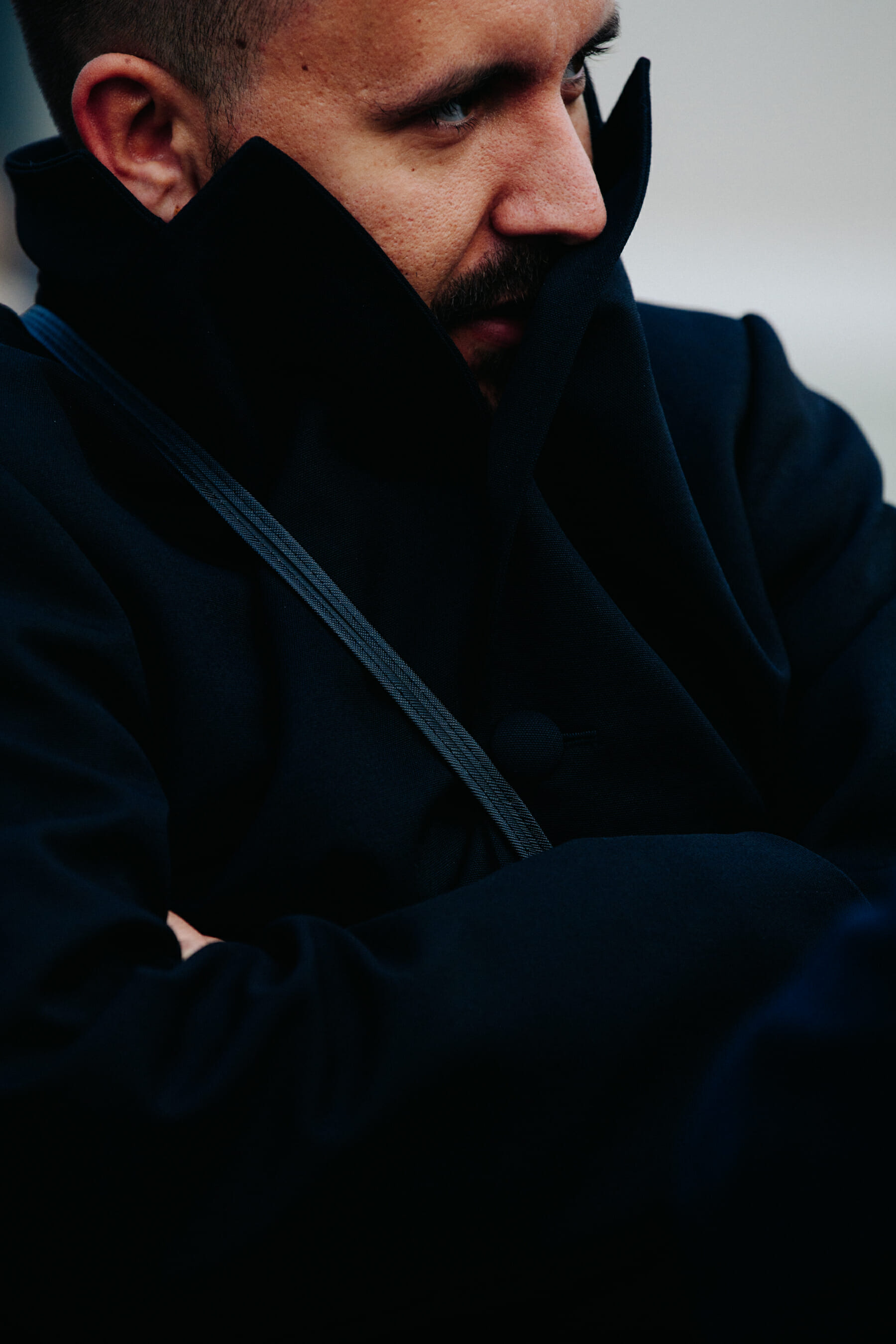 Man wearing black coat