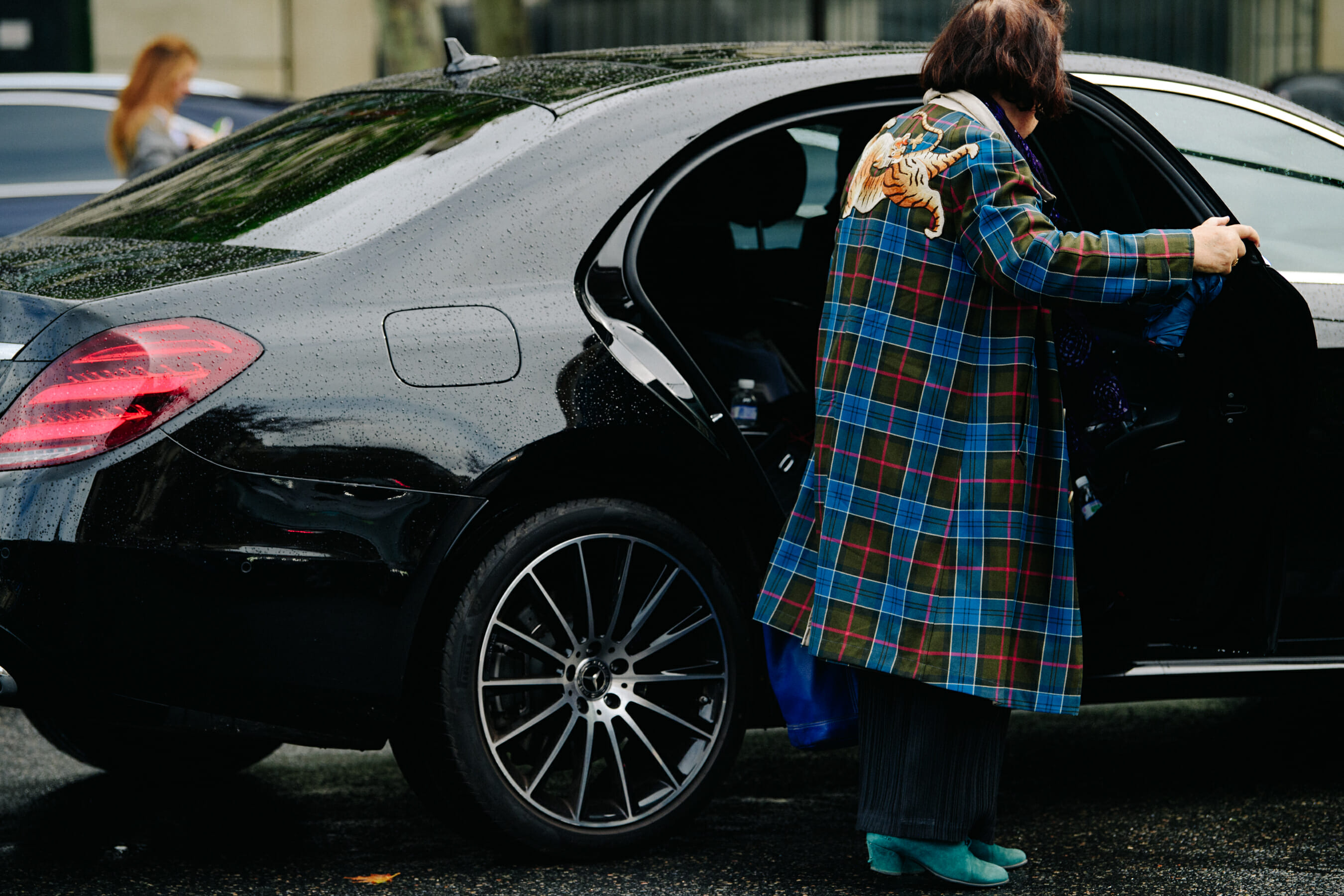 Woman wearing check coat