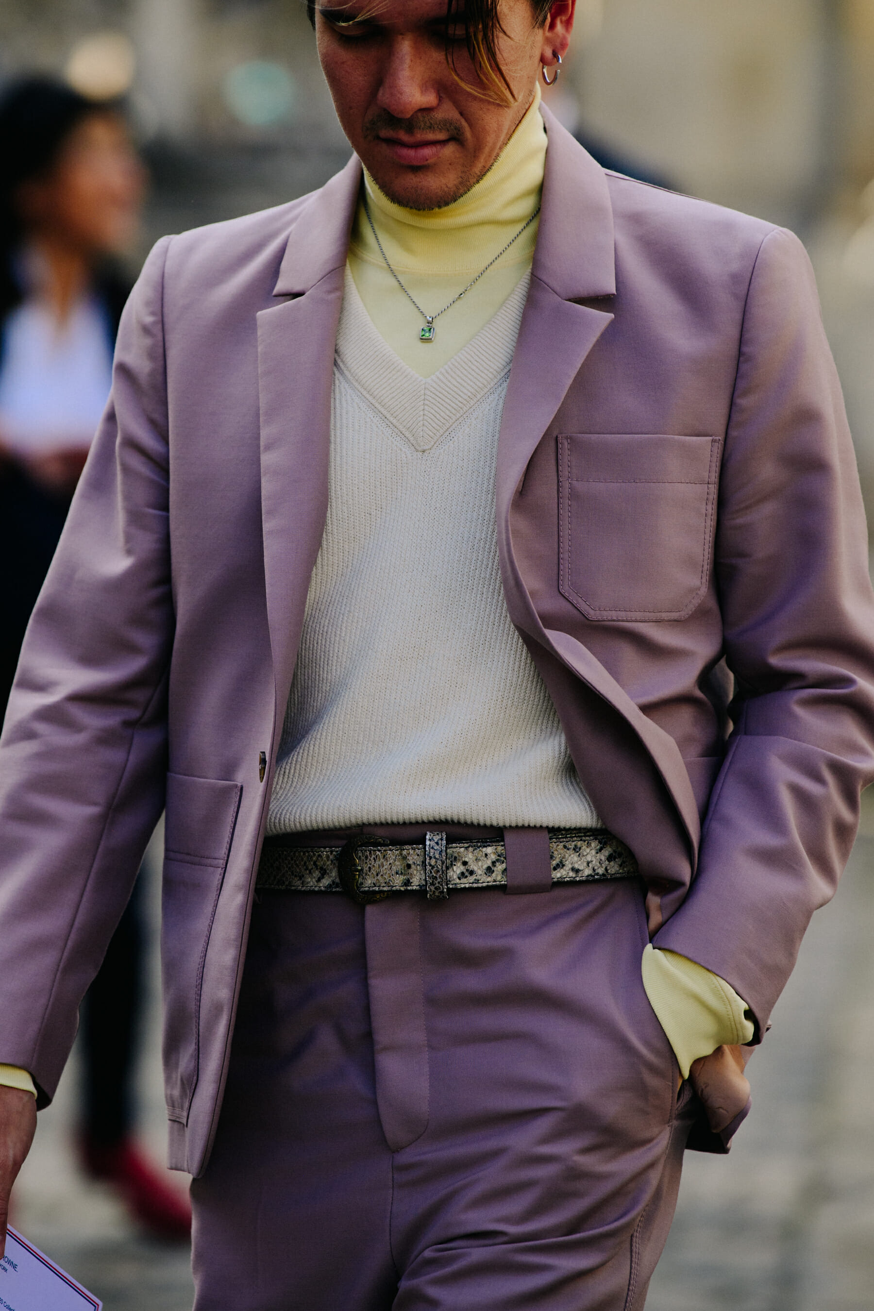 Man wearing purple suit
