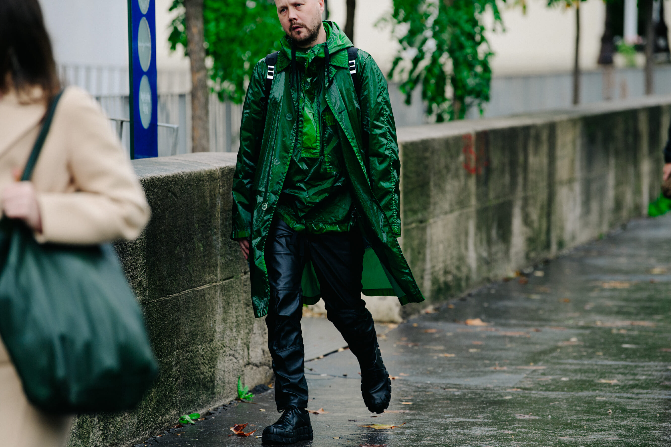Man wearing green coat