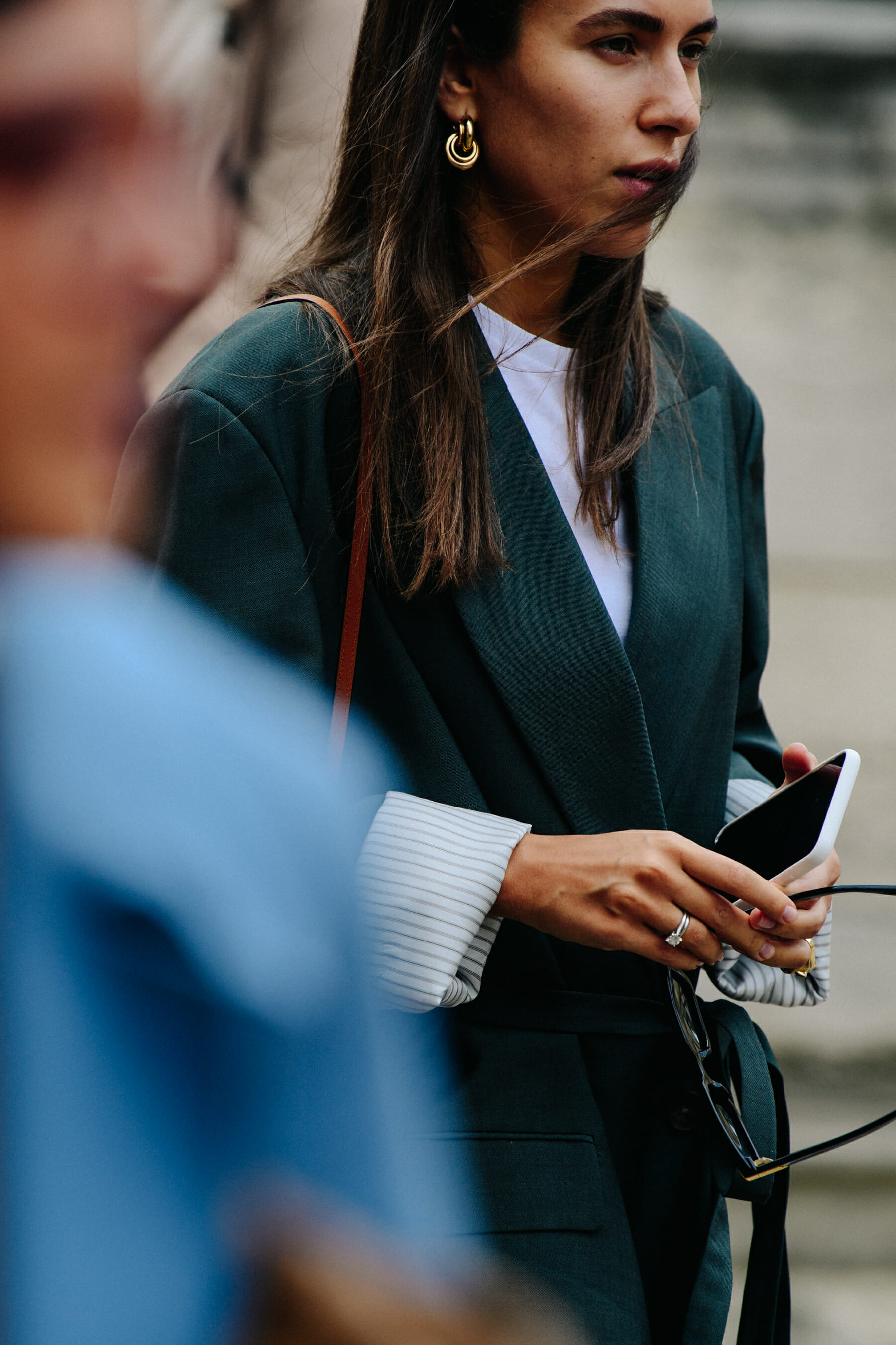 Woman wearing green blazer