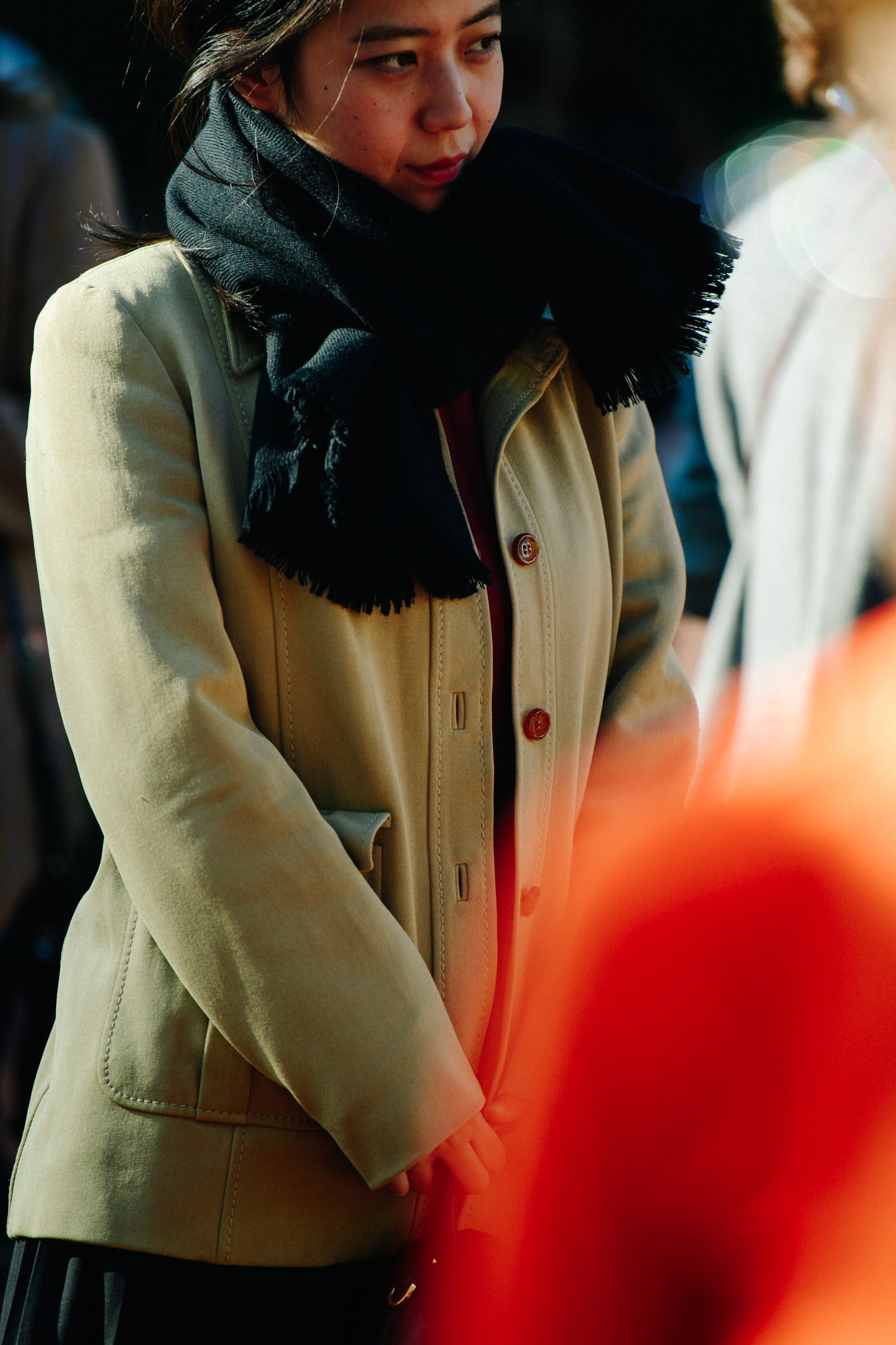 Woman wearing black scarf