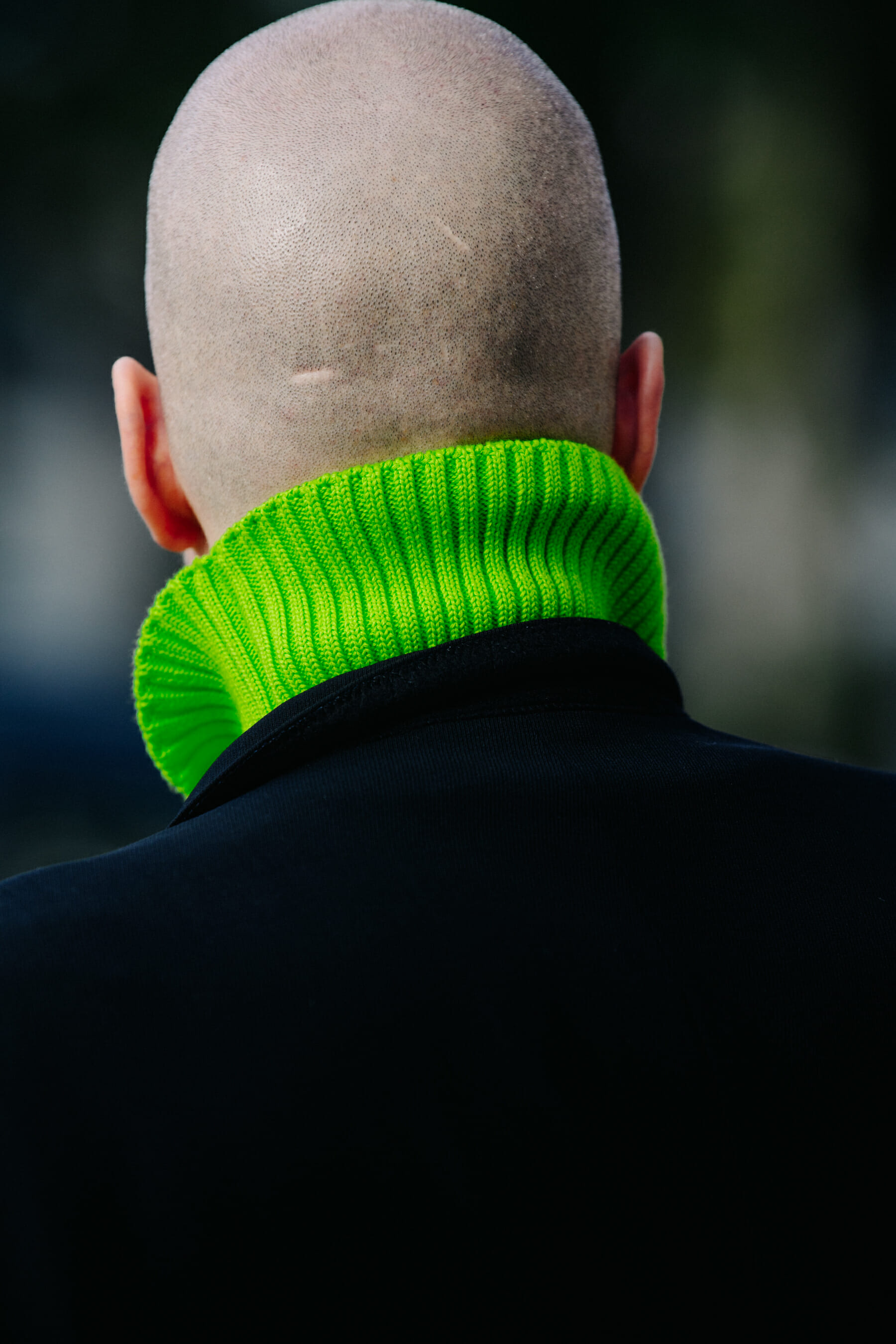 Man wearing green high neck