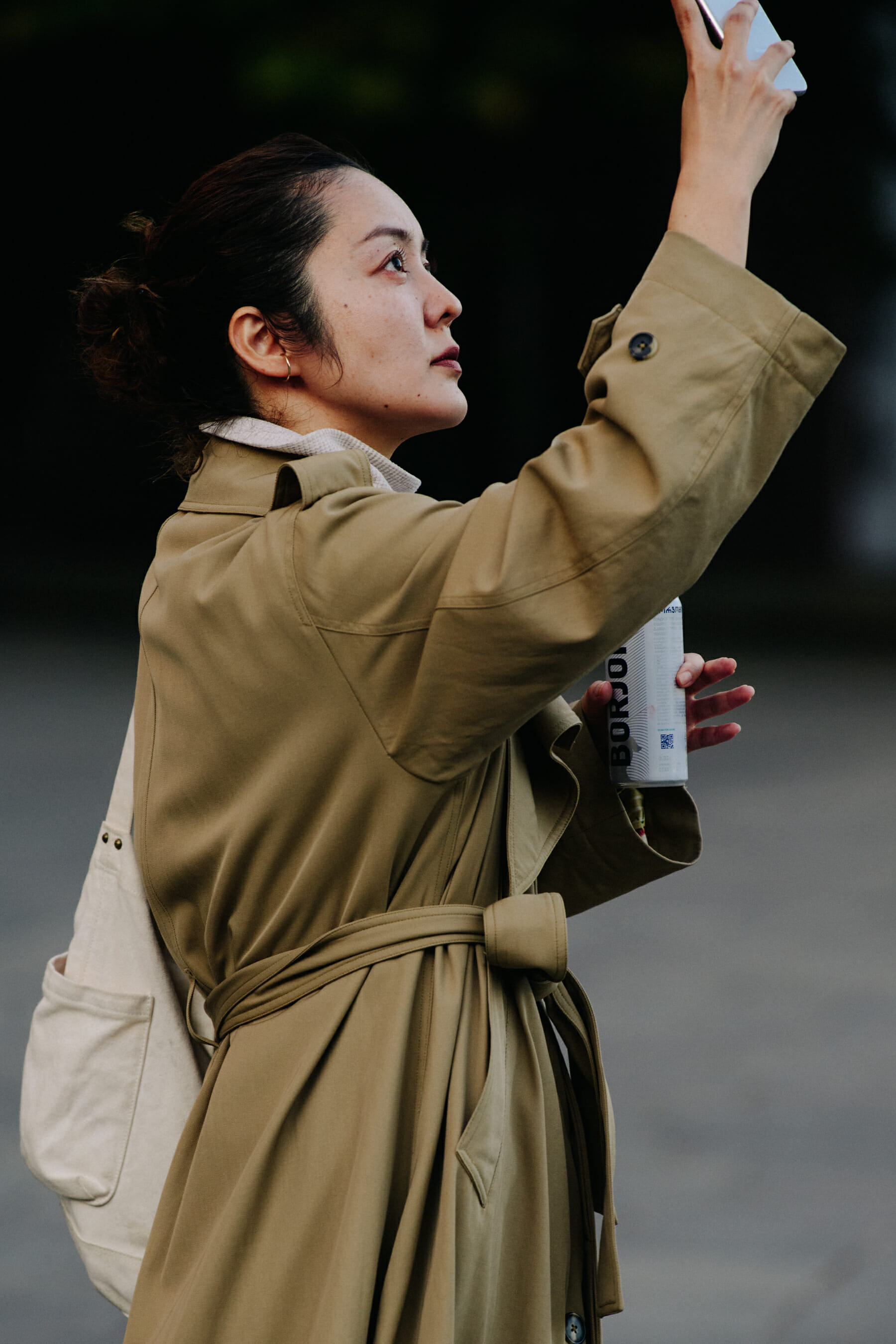 Woman wearing brown coat