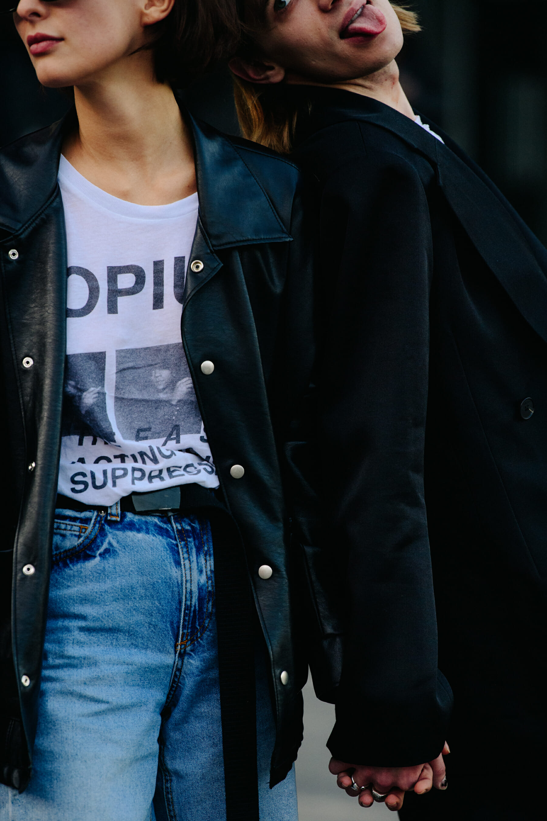 Couple wearing black jackets