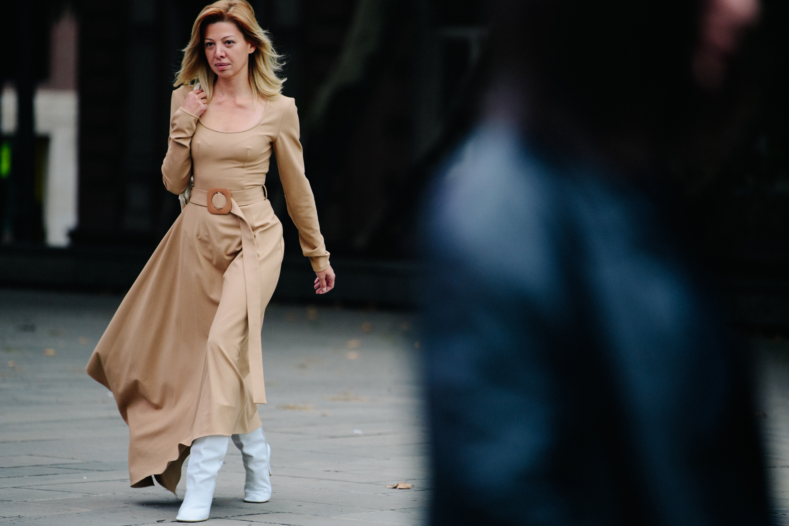 Woman wearing tan dress