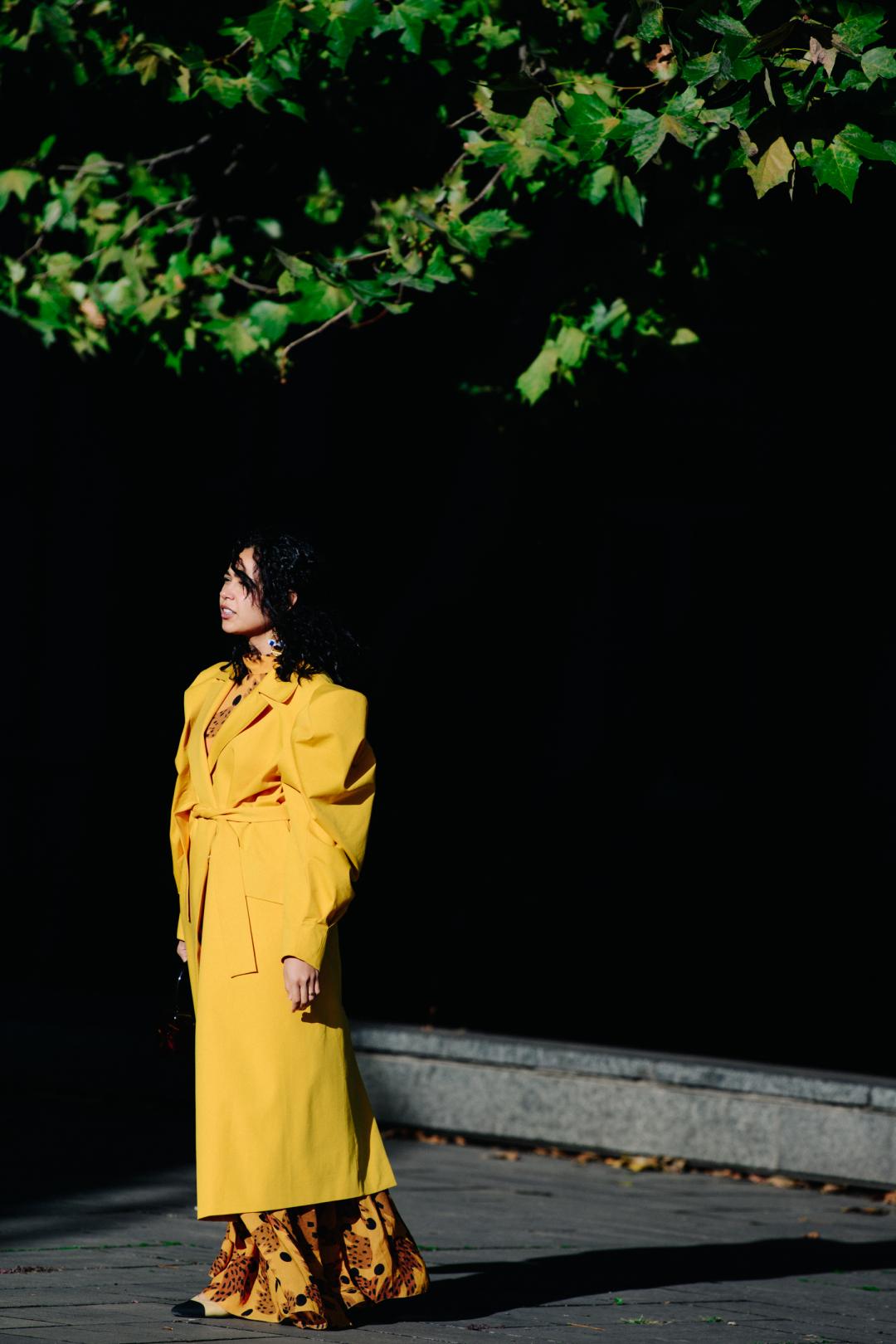 Woman wearing yellow coat