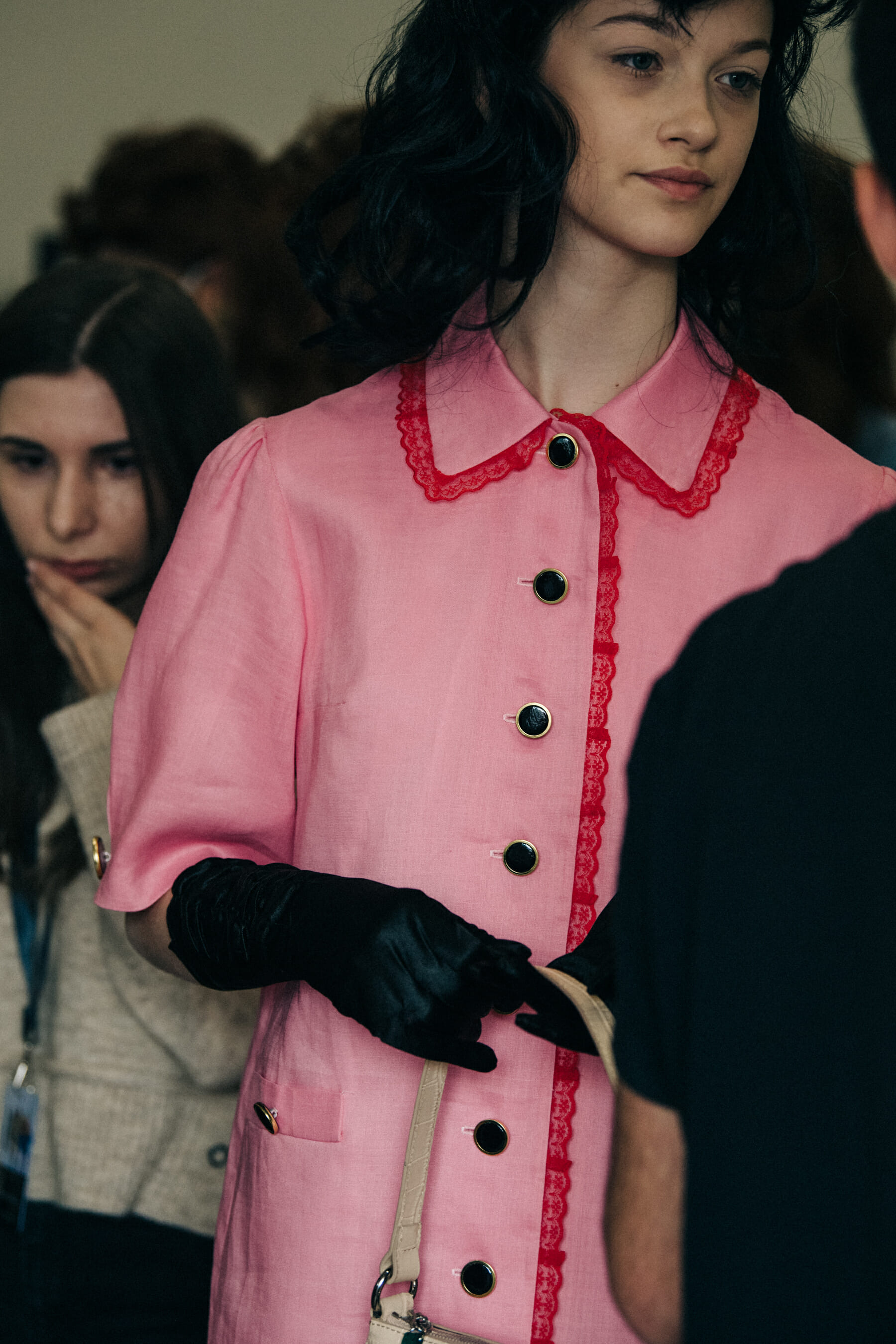 Model wearing pink backstage
