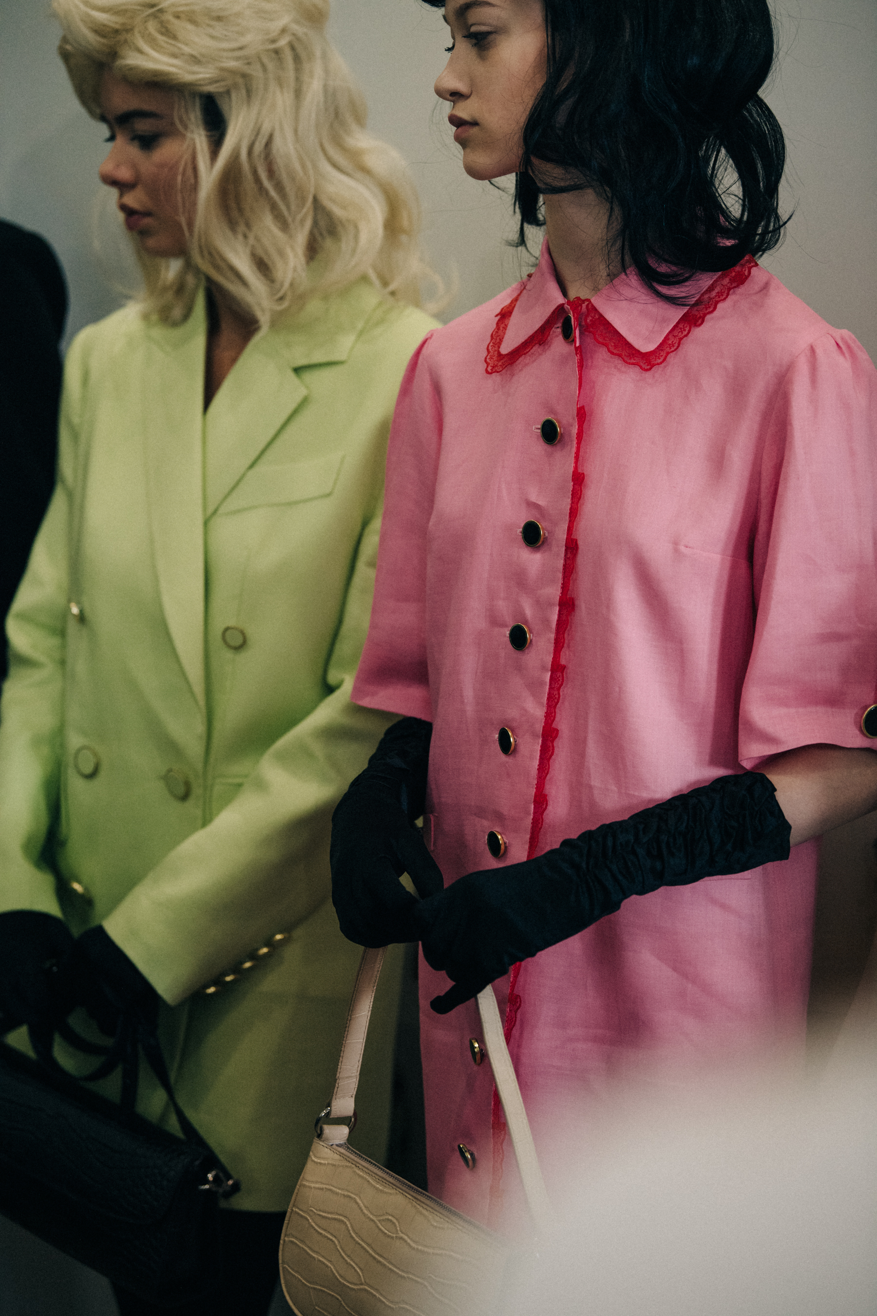 Model wearing pink backstage