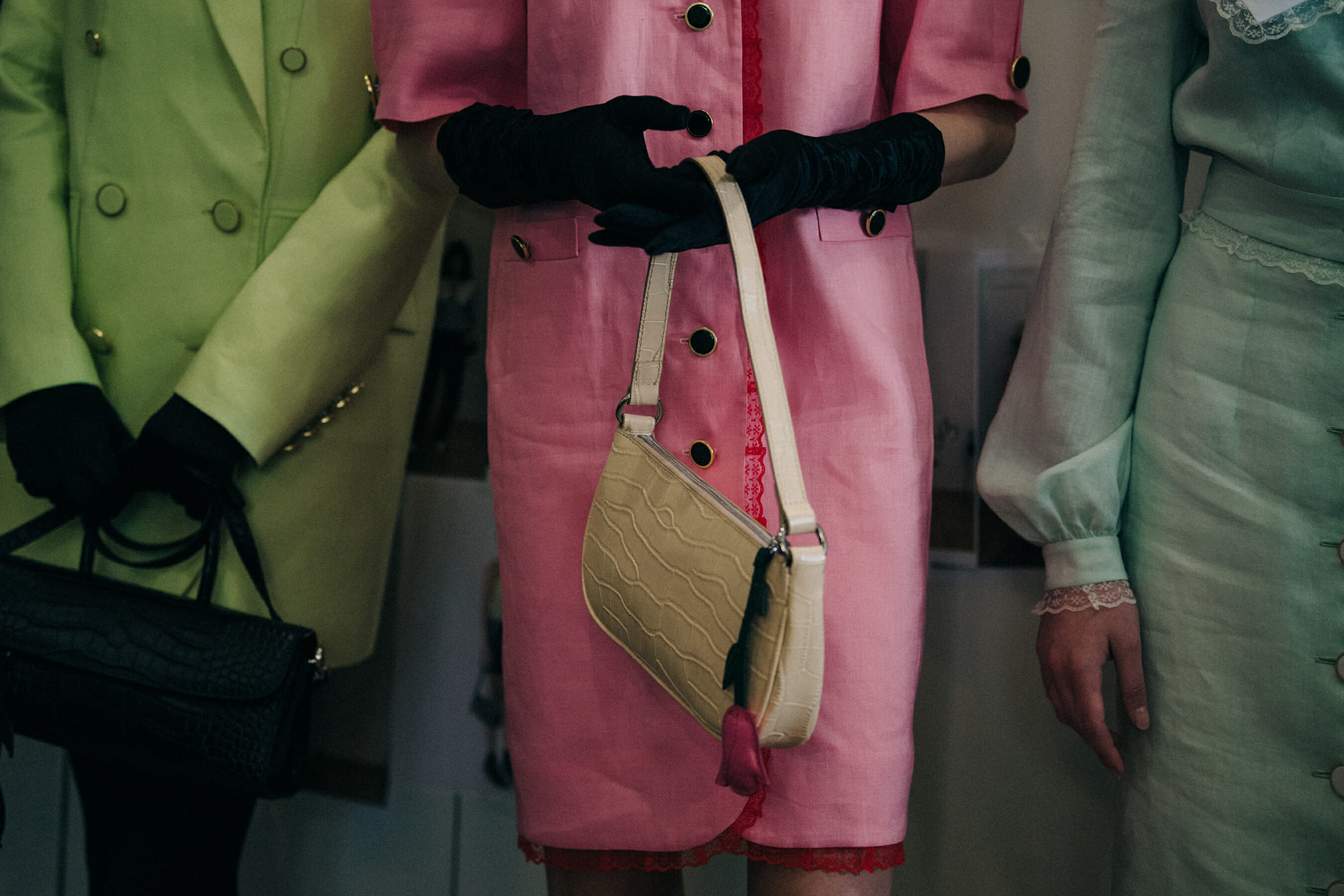 Model wearing pink backstage