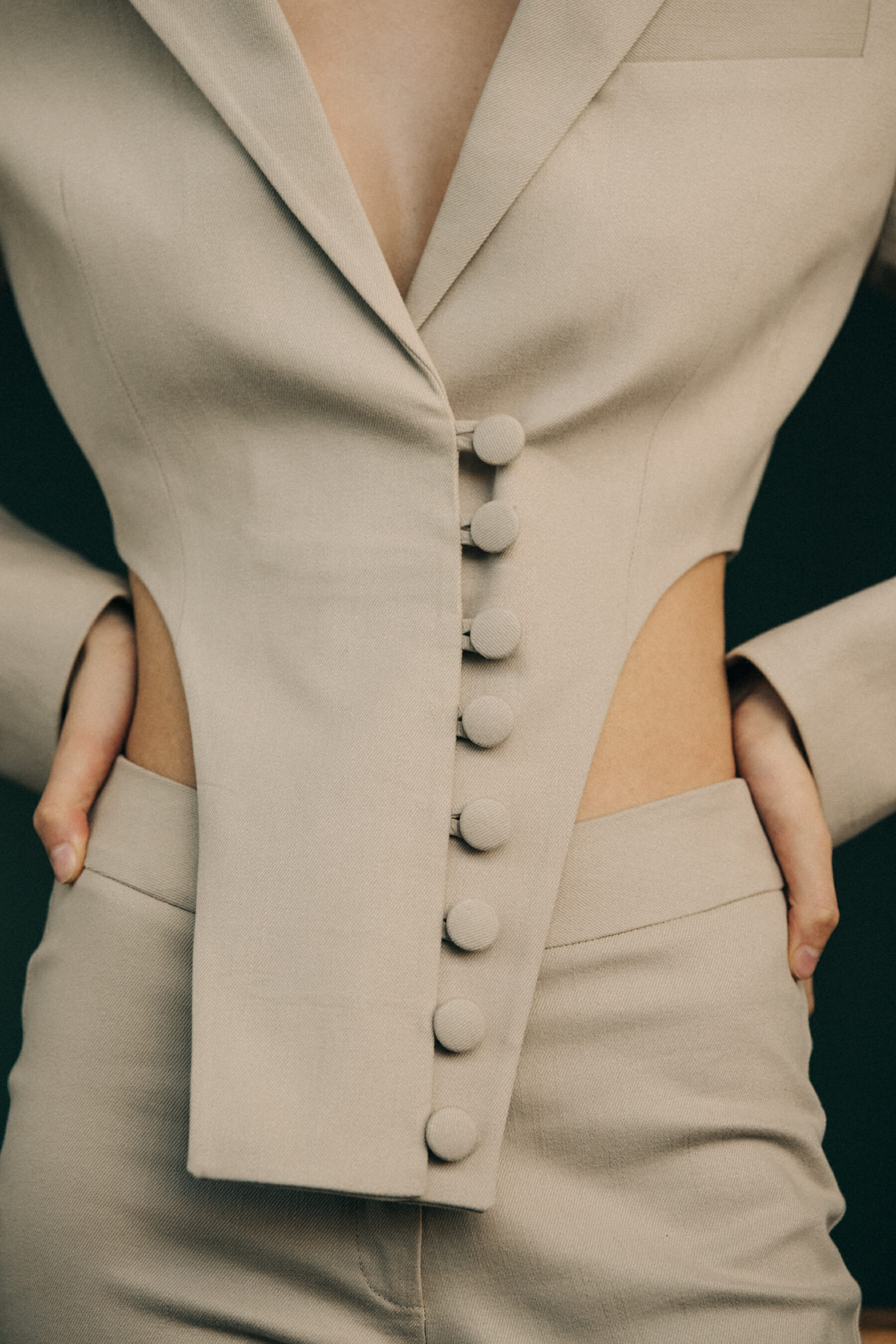 Model wearing tan suit