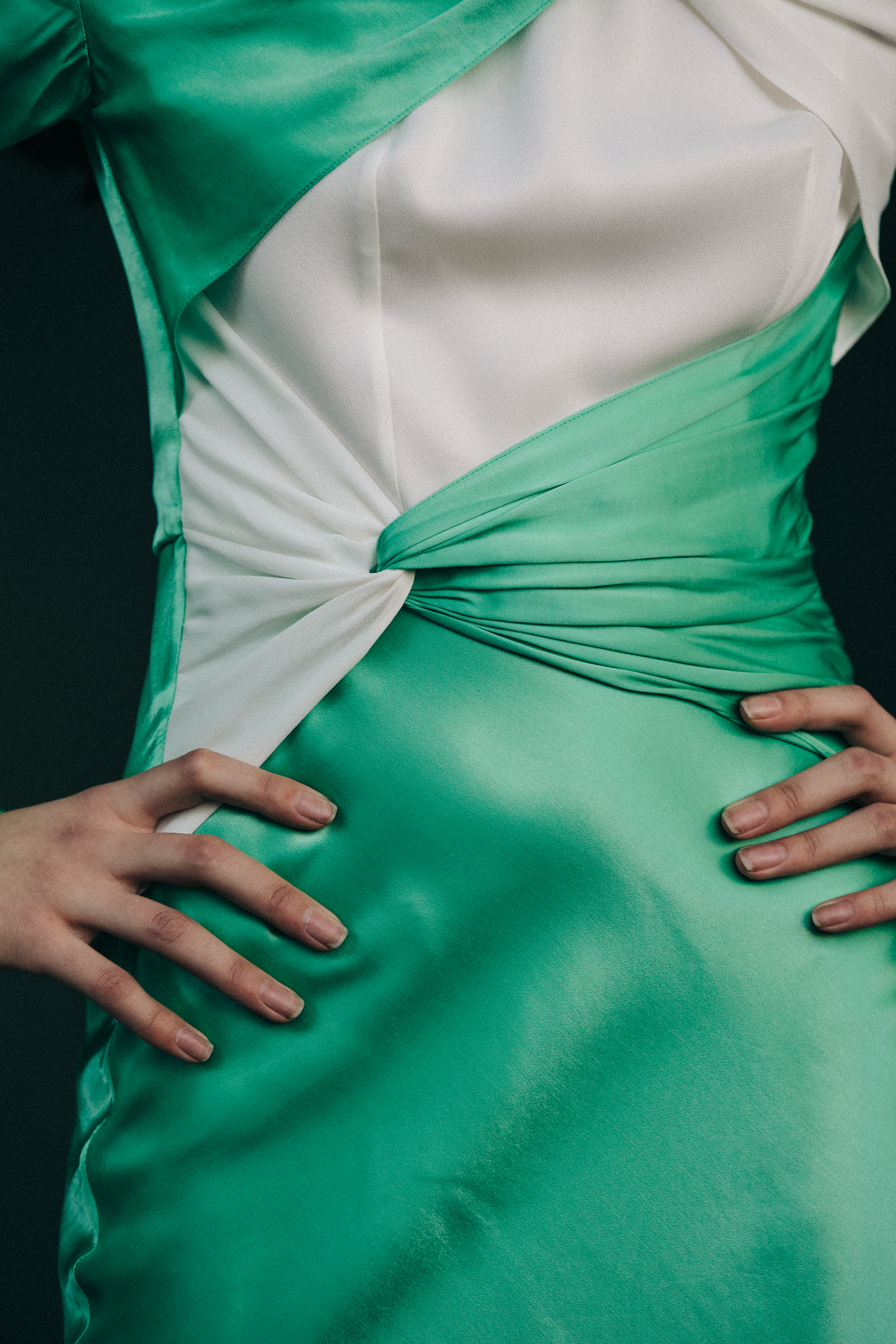 Model wearing green dress