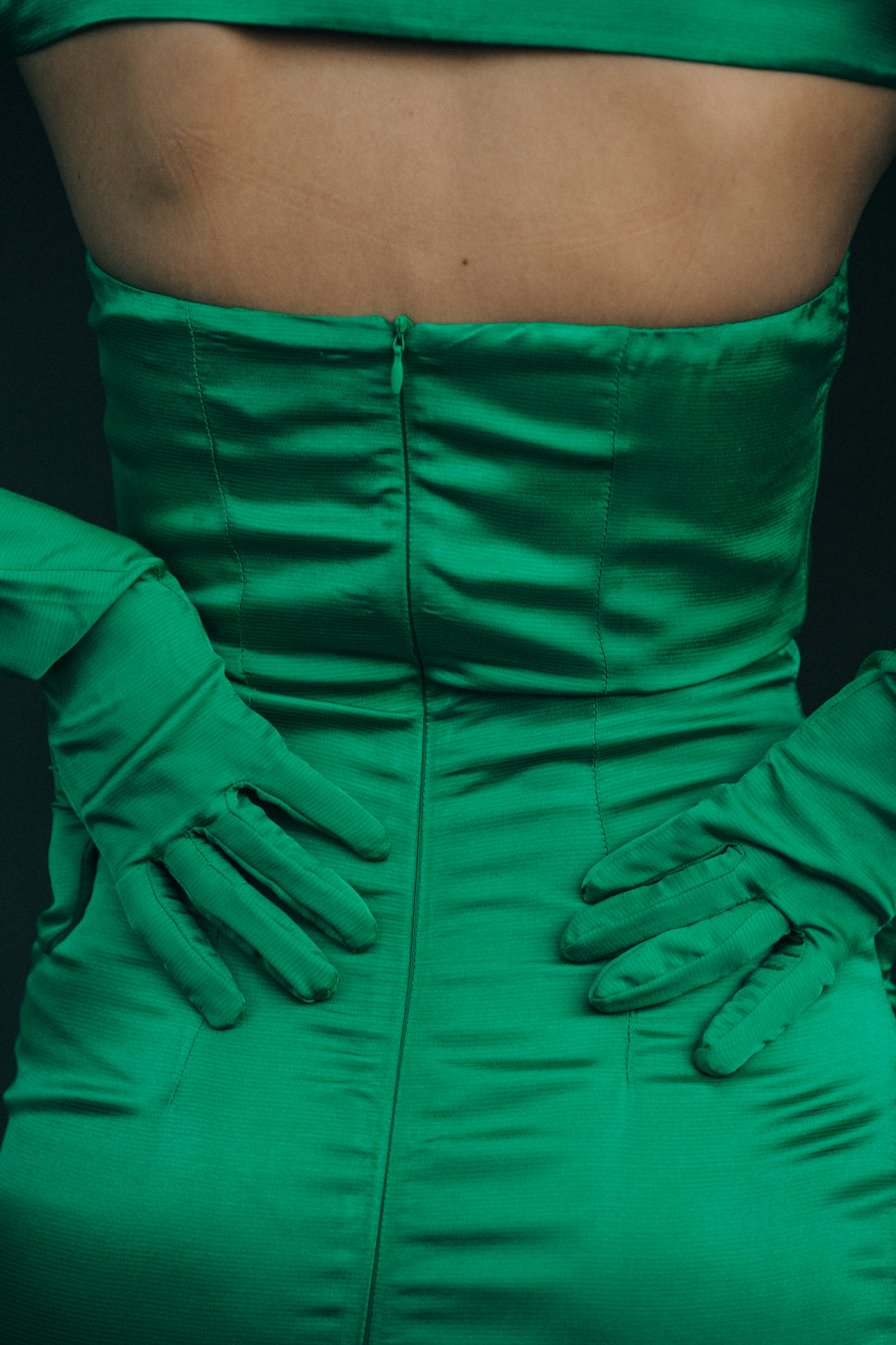 Model wearing green dress