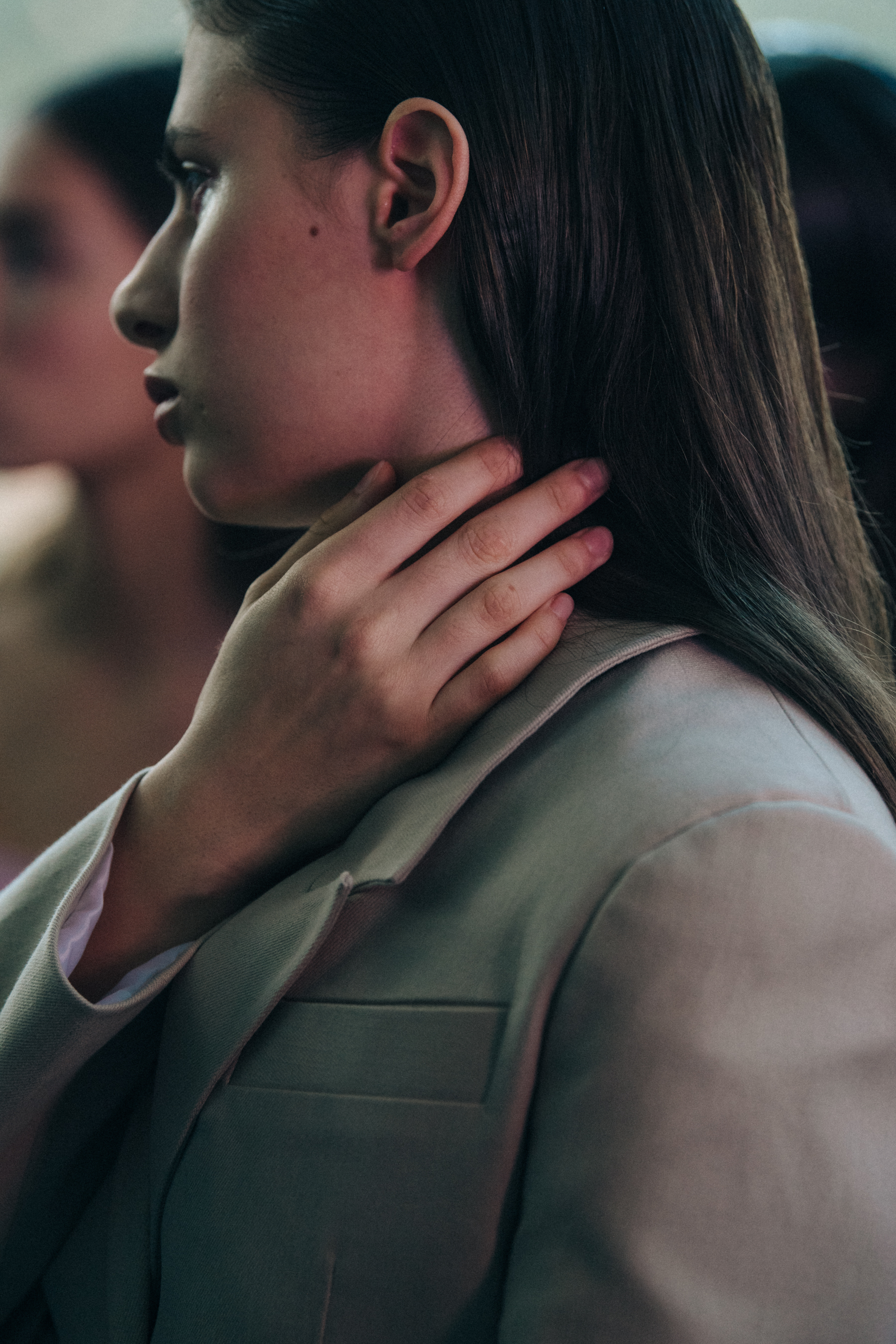 Model wearing tan suit