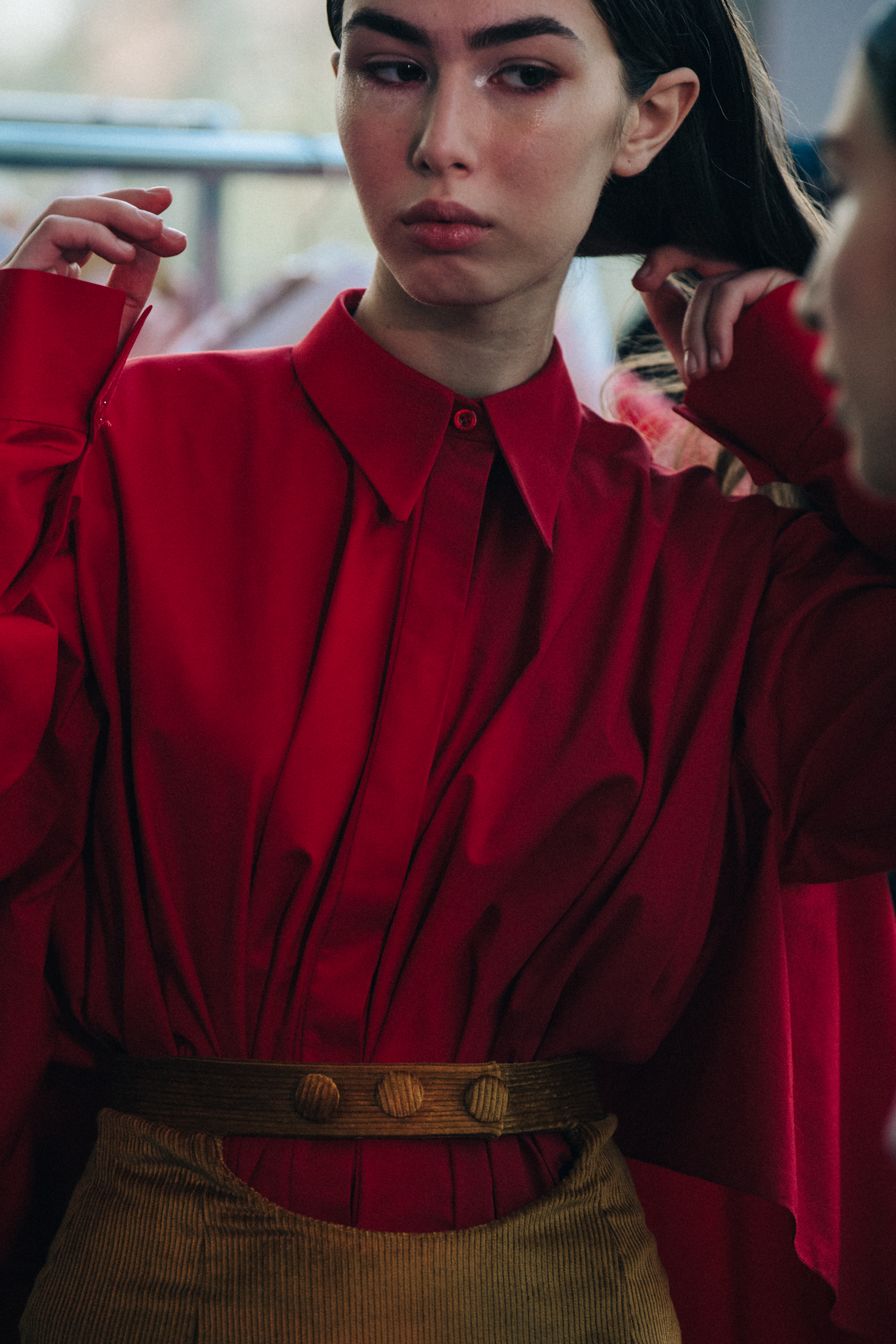 Model wearing red dress