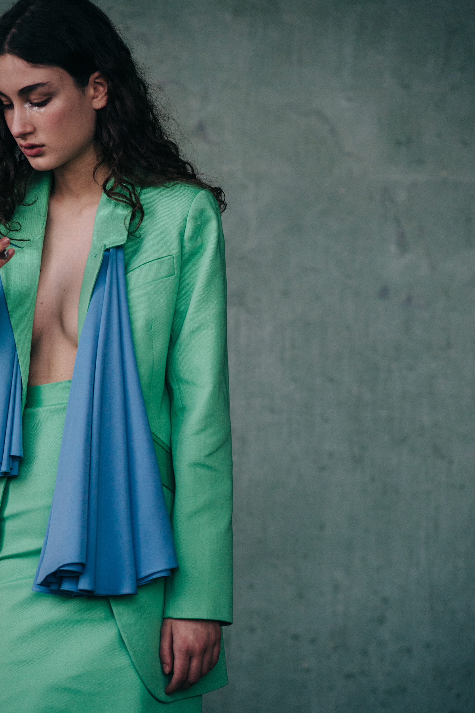 Model wearing green dress