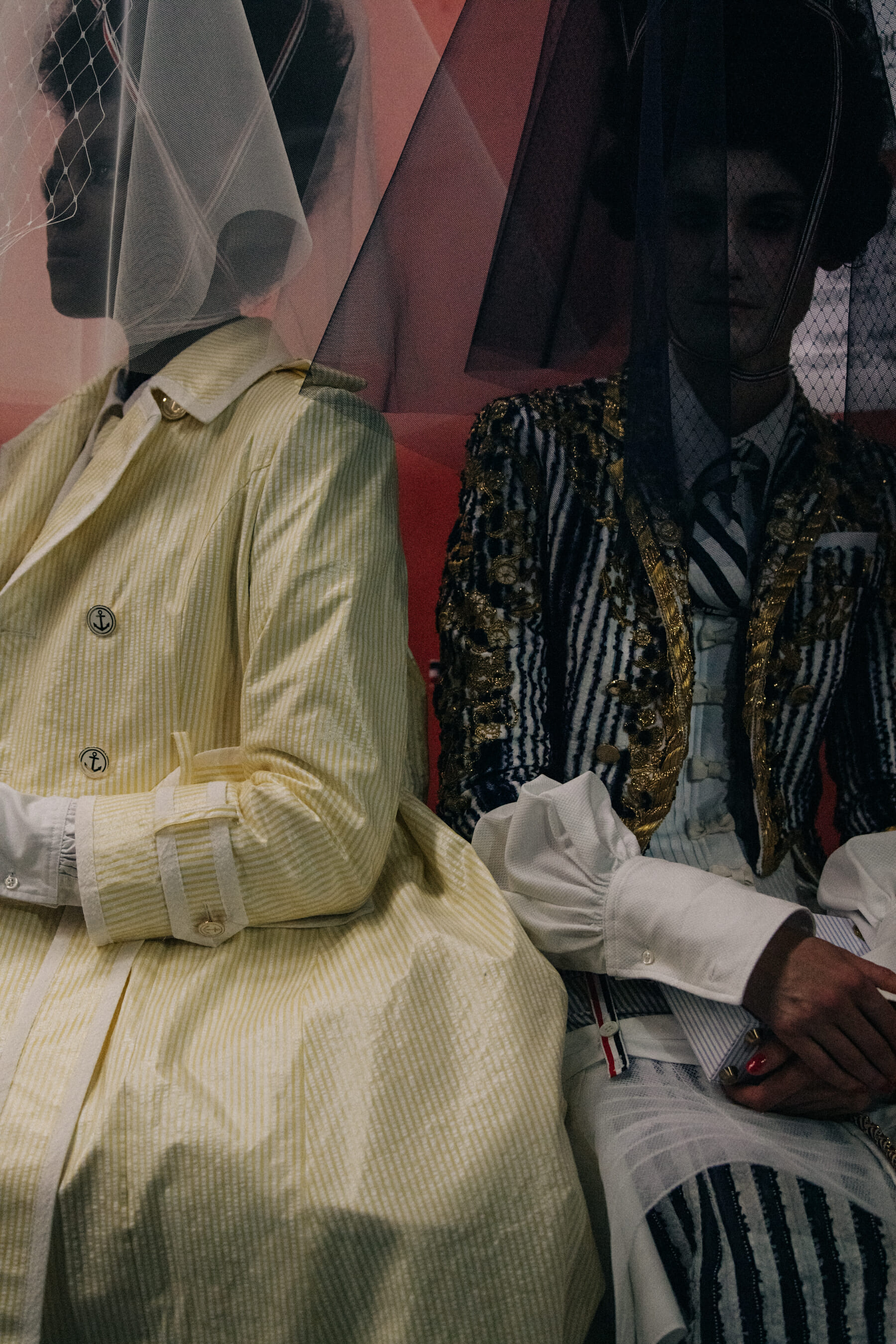 Models wearing tall wigs at Thom Browne