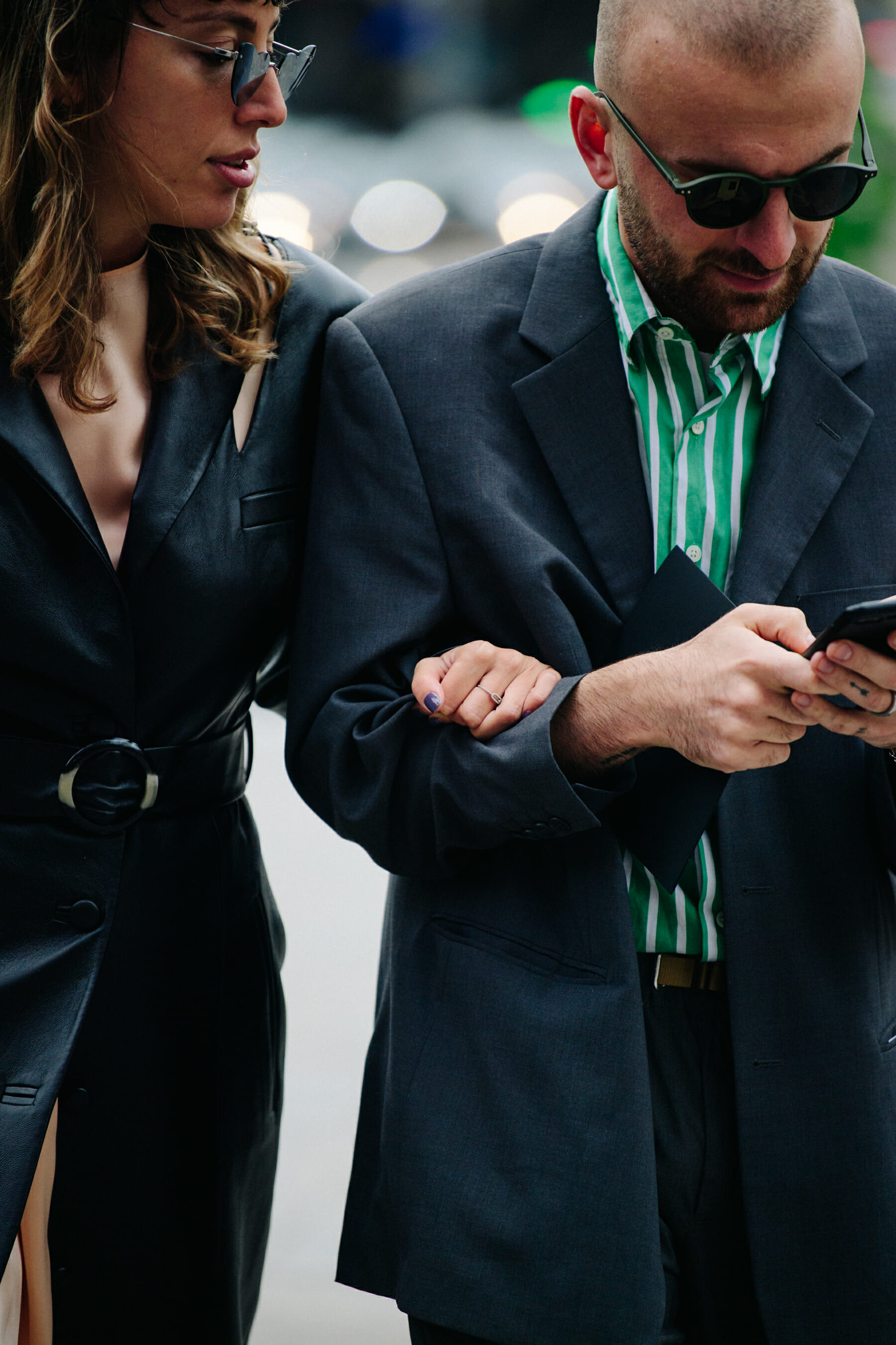 Couple wearing grey suits