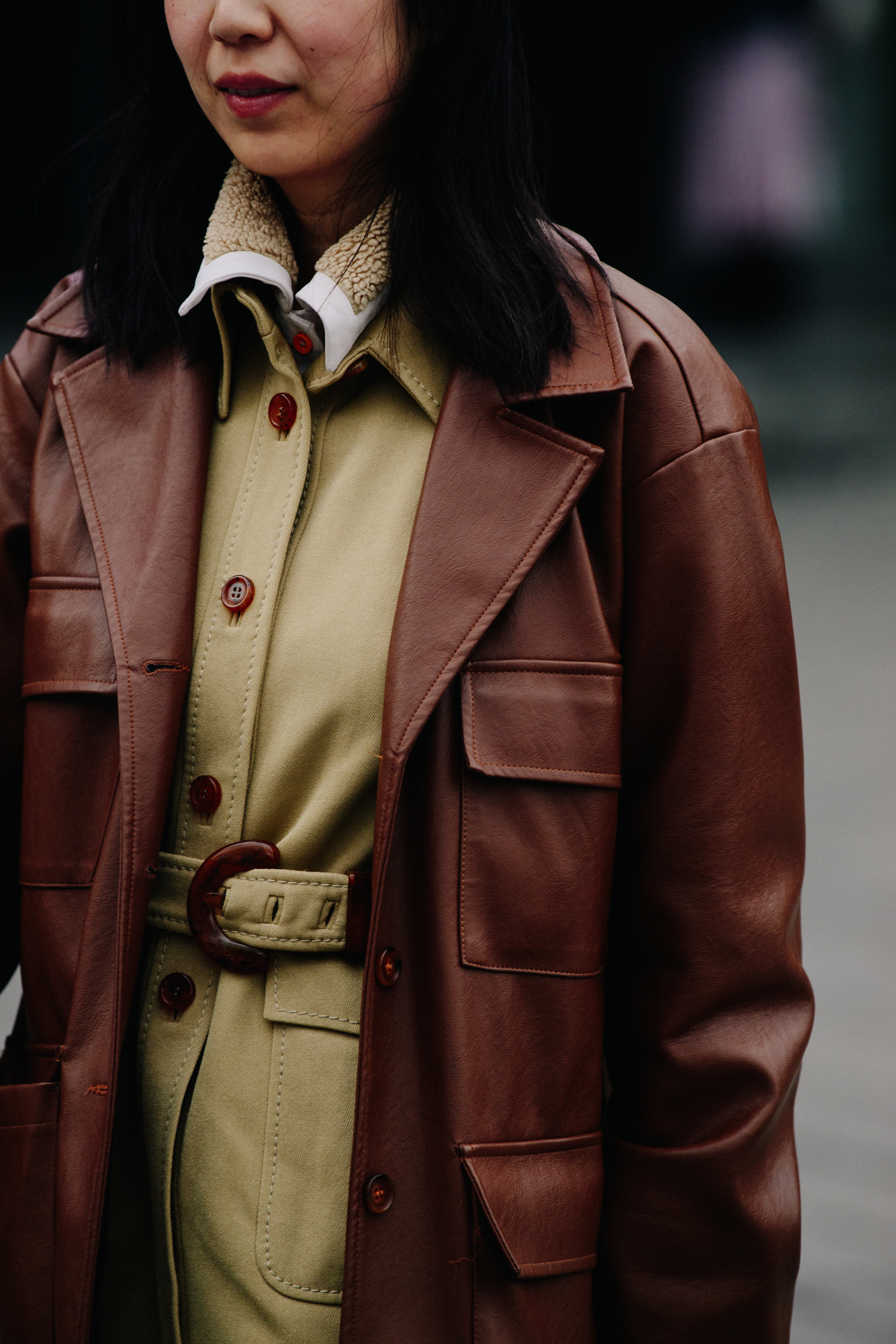 Woman wearing leather coat