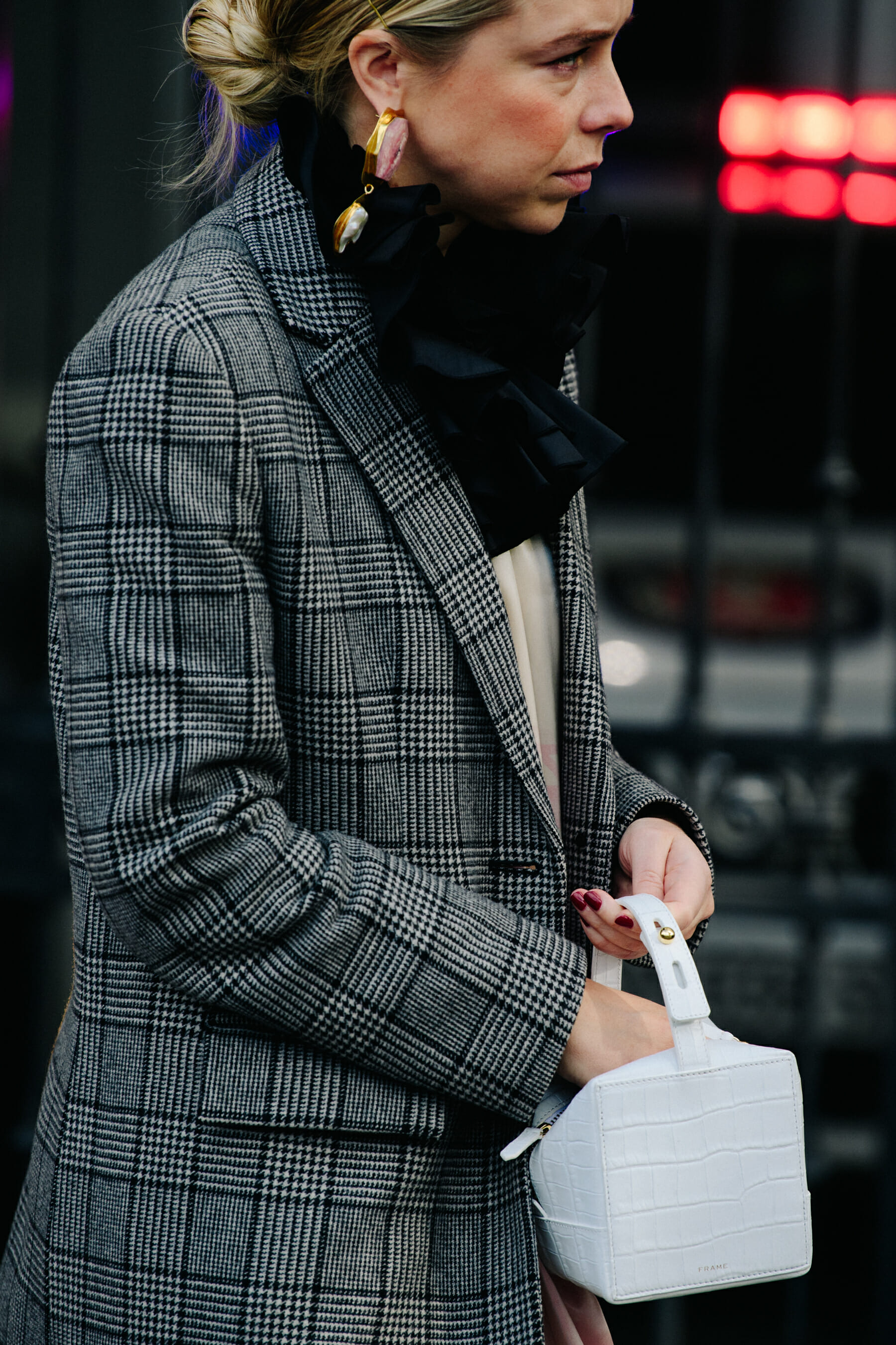 Woman wearing check coat