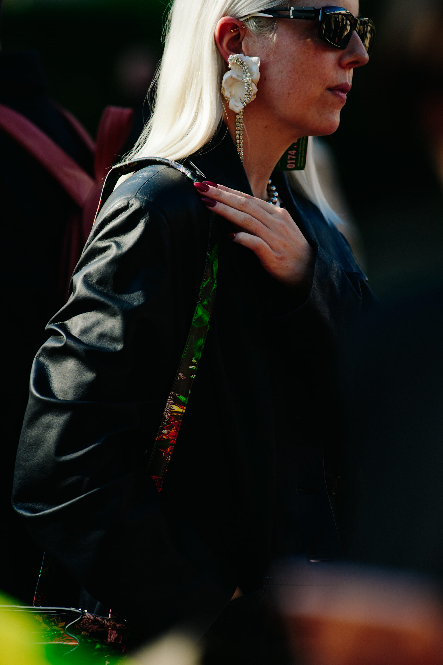 Woman wearing colourful bag