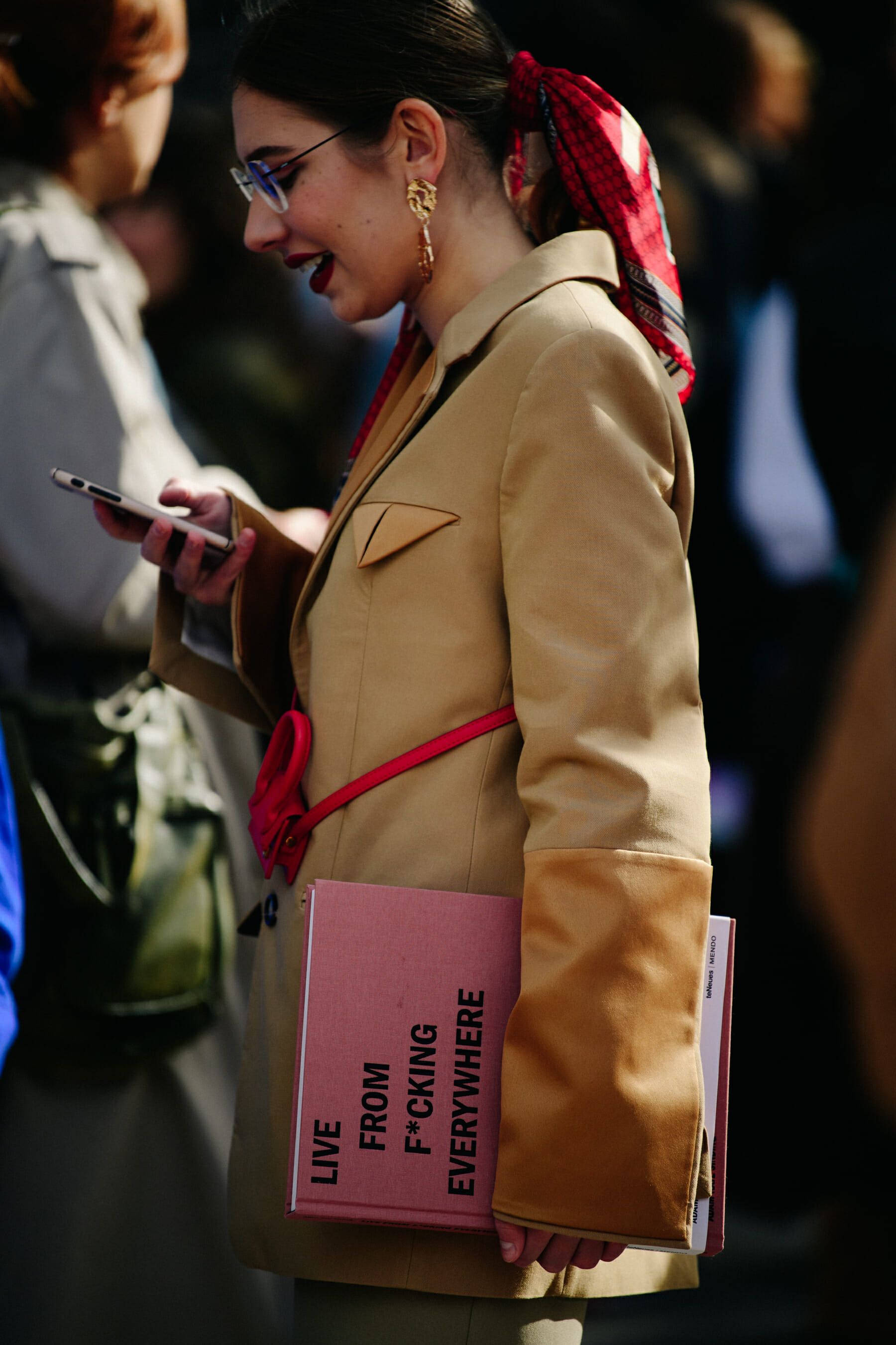 Woman carrying Adam Katz Sinding book