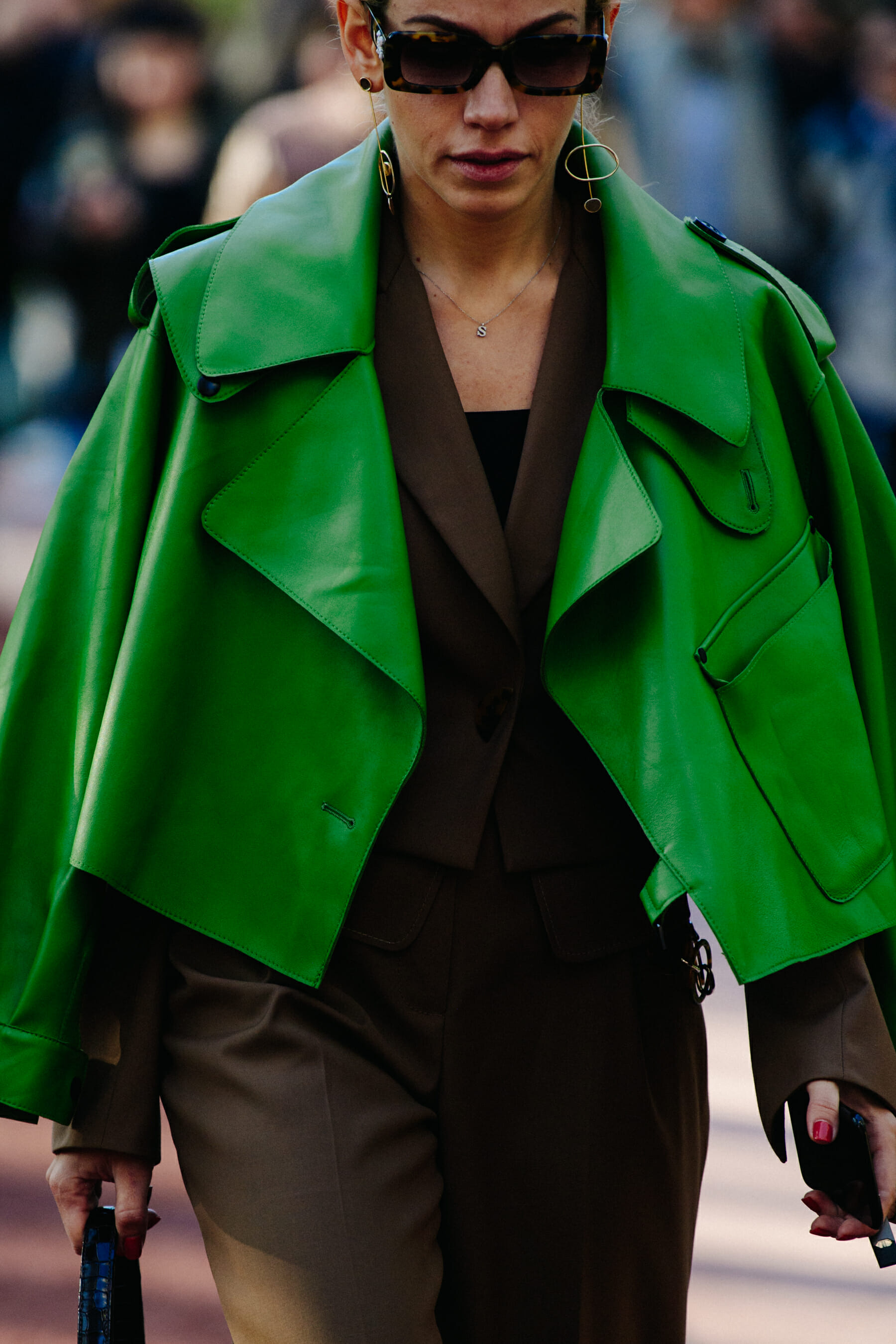 Woman wearing green jacket