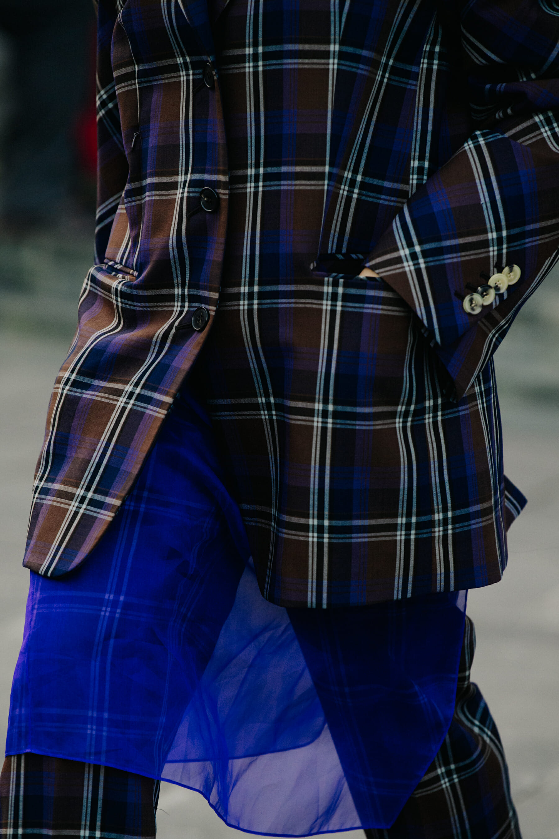 Woman wearing check suit