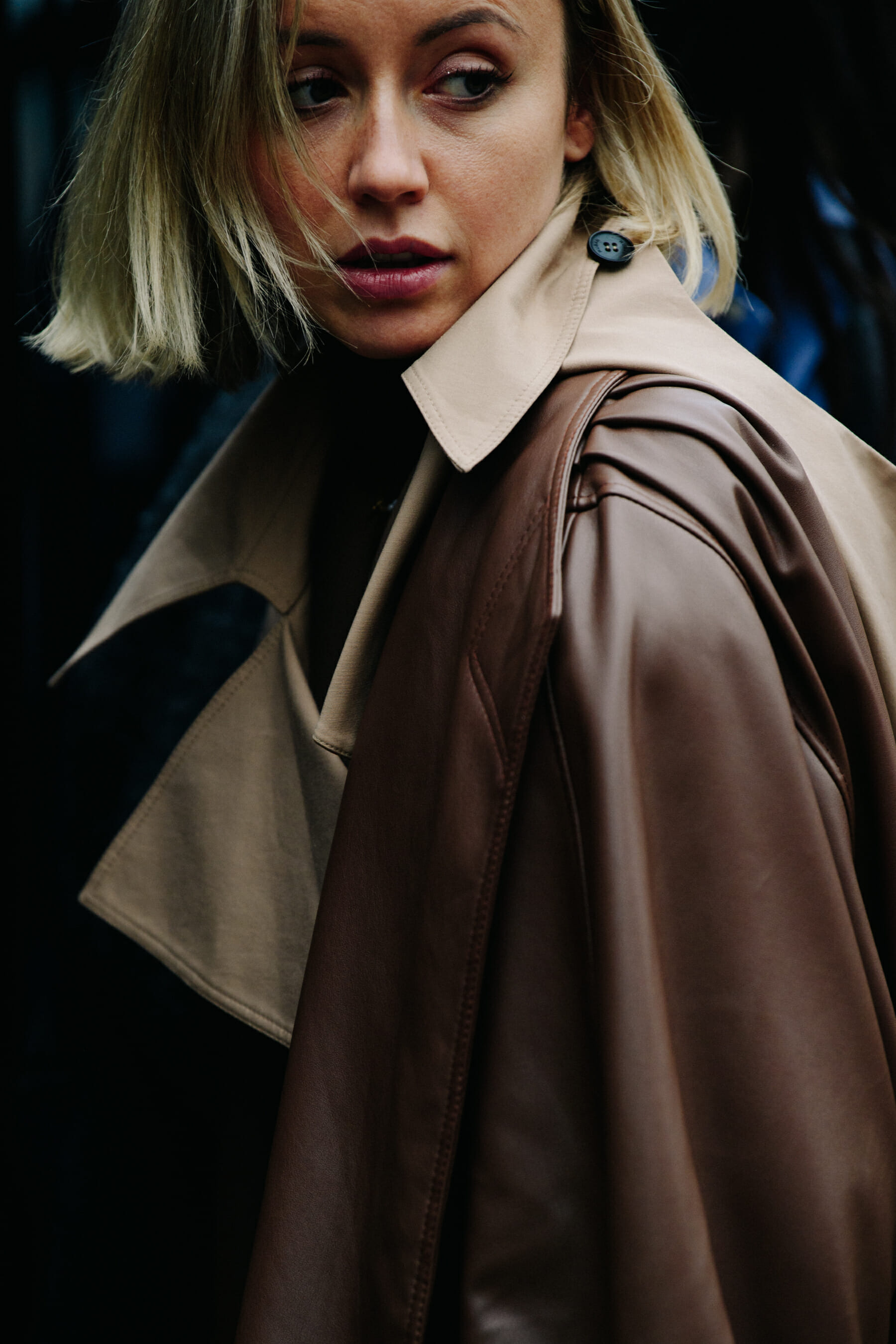 Woman wearing brown leather coat